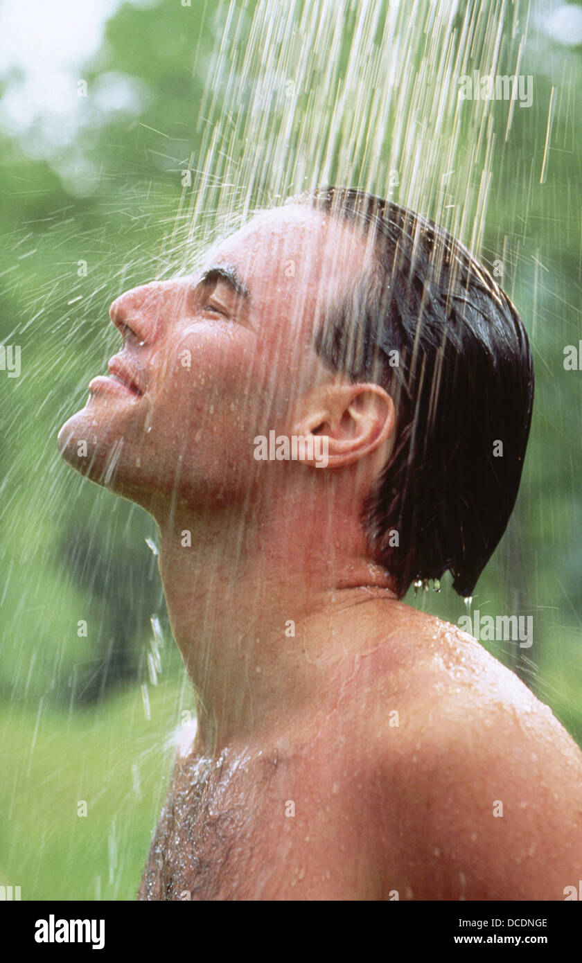 man showering outdoors Stock Photo Alamy