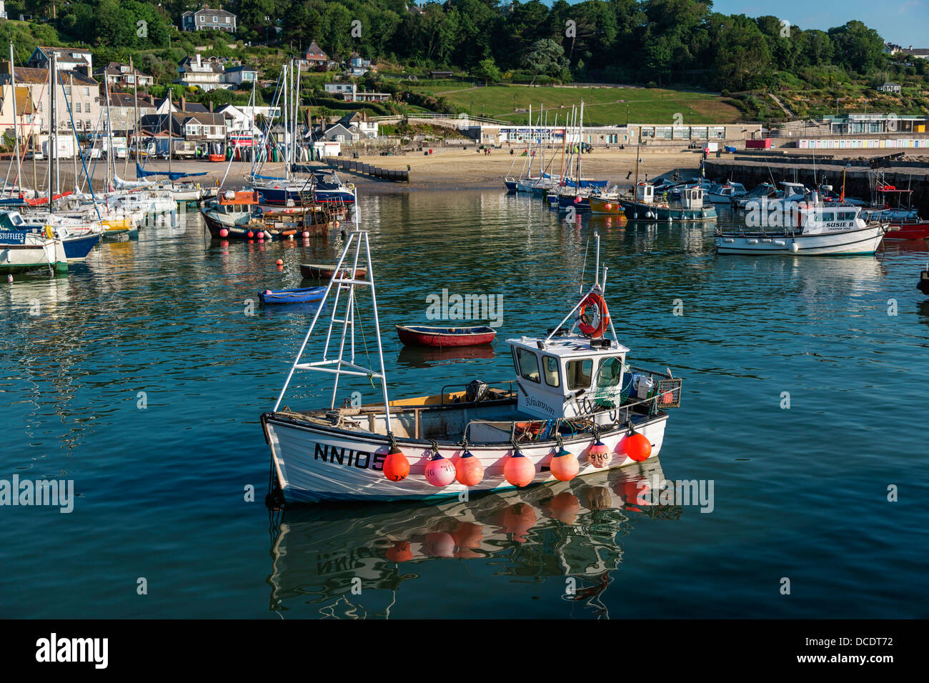 Boats floating in Lyme Regis Harbour Dorset Stock Photo - Alamy