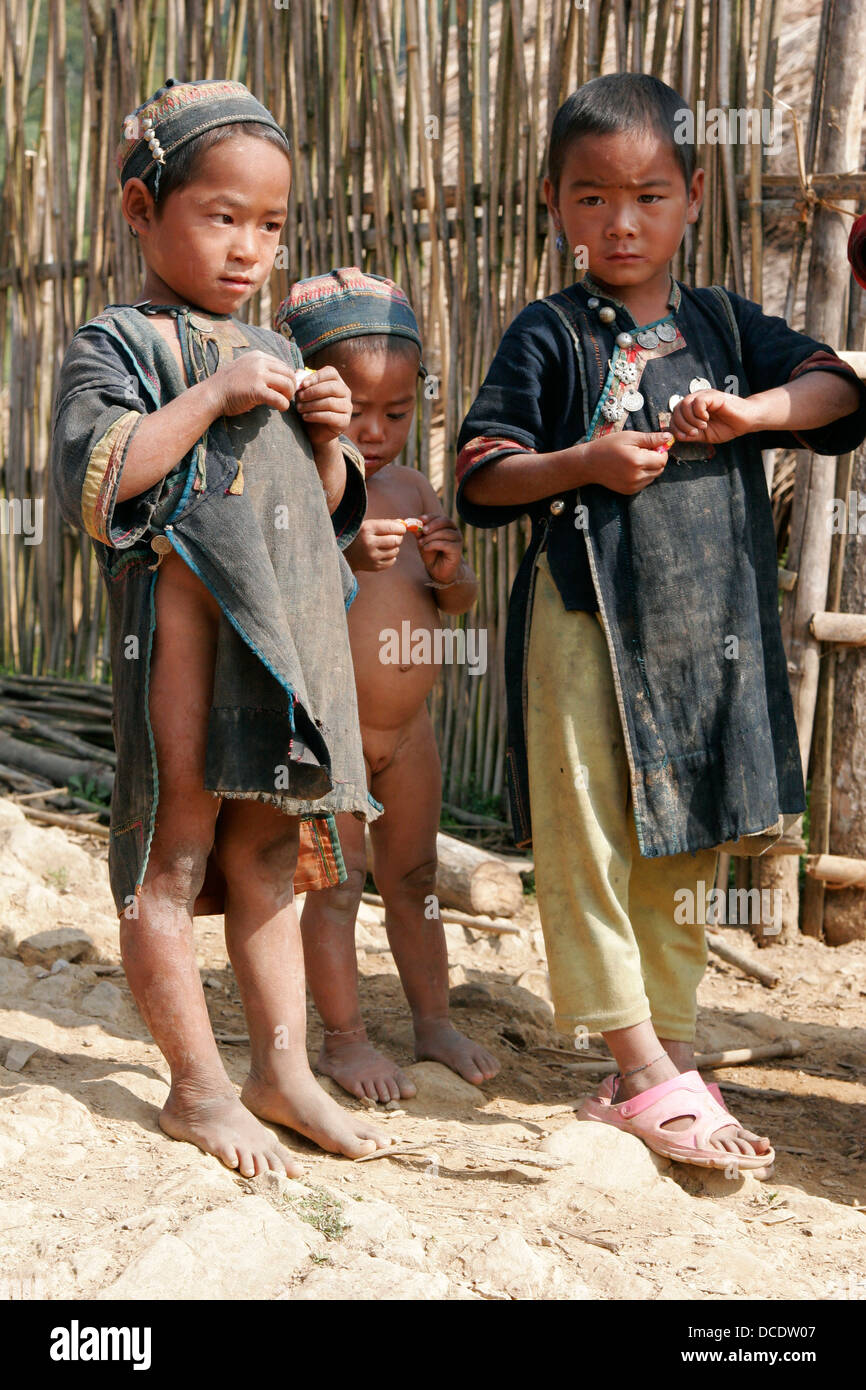 tribes kids Ethnic Akha children wearing traditional clothes in tribal village near  Phongsali, Laos Stock Photo - Alamy
