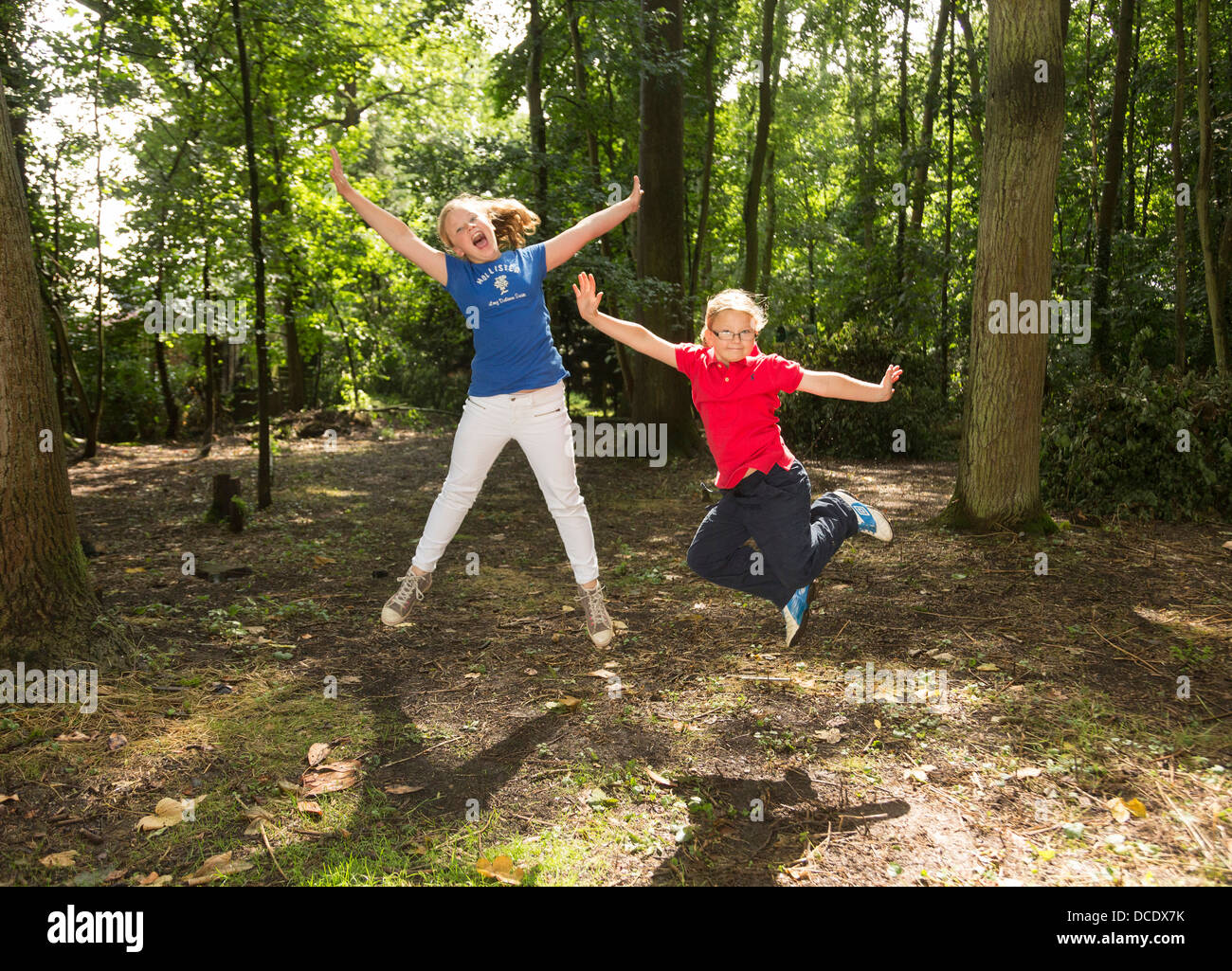 two girls playing outdoors Stock Photo
