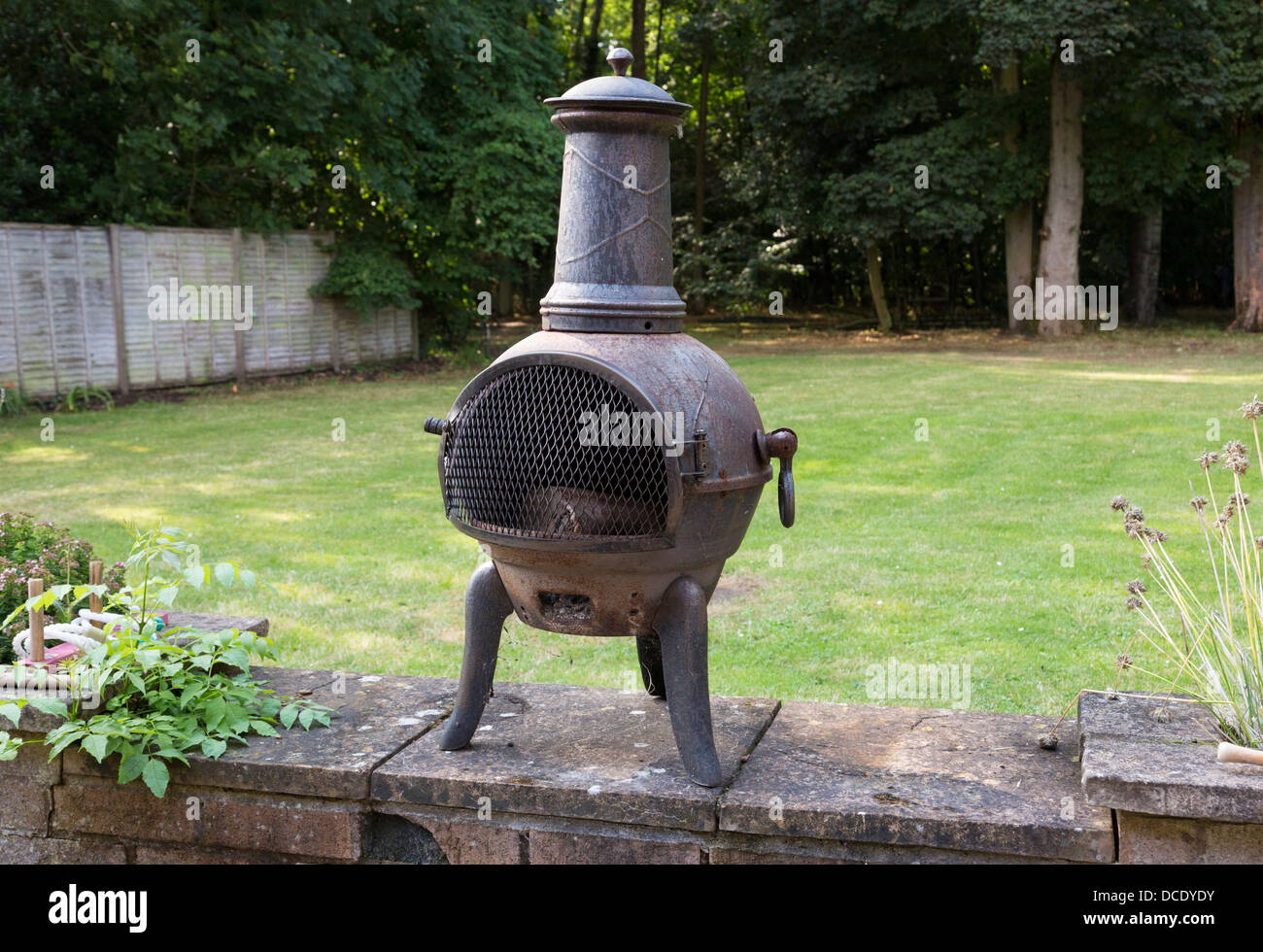 chiminea heater in garden uk Stock Photo