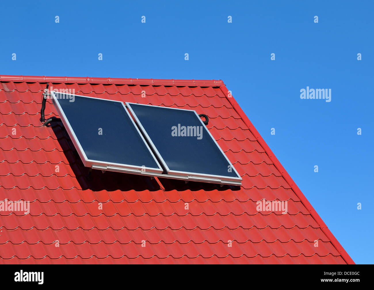 Solar cells on a house roof hi-res stock photography and images - Alamy