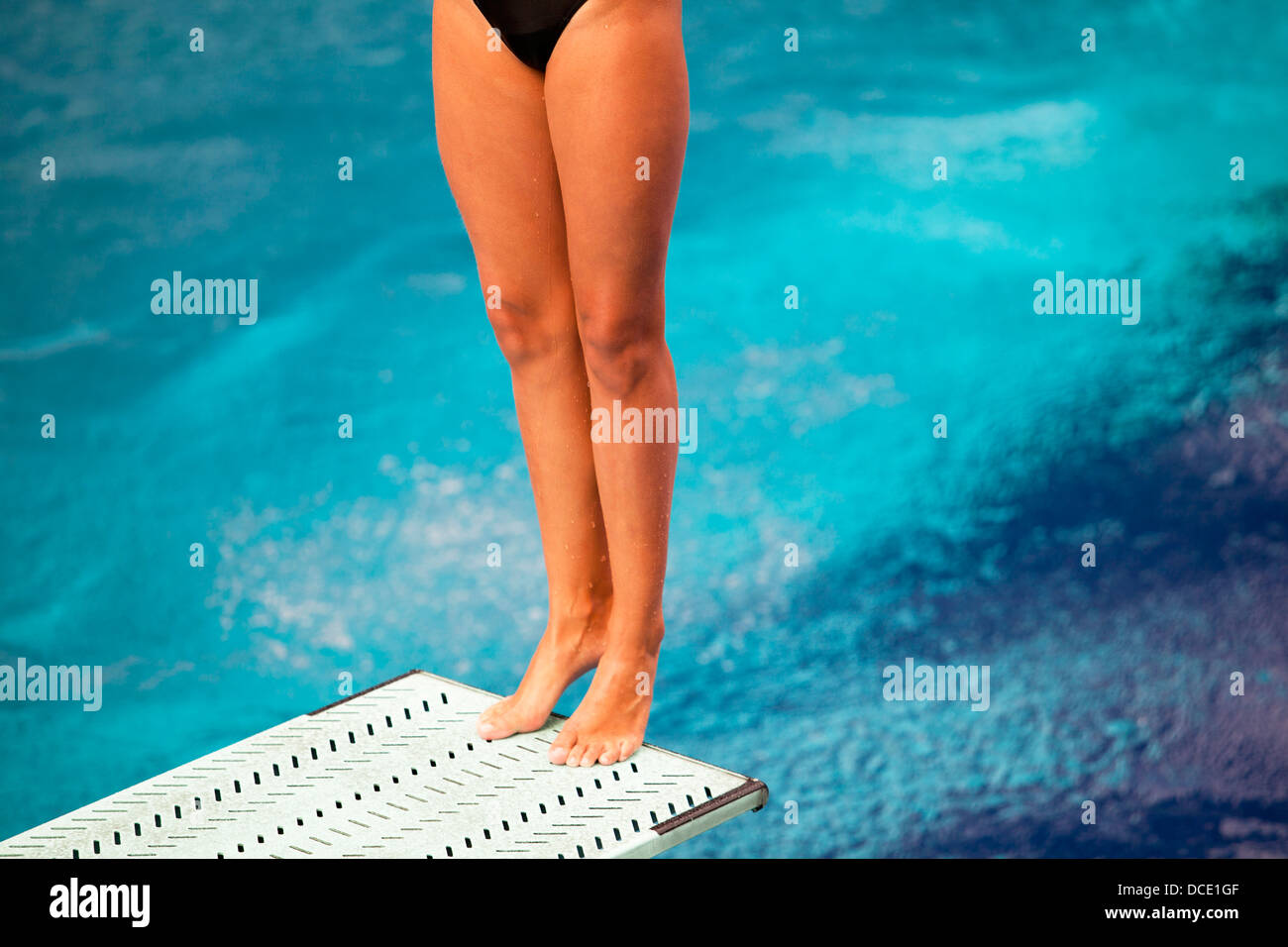 high diver jumping into the water Stock Photo Alamy