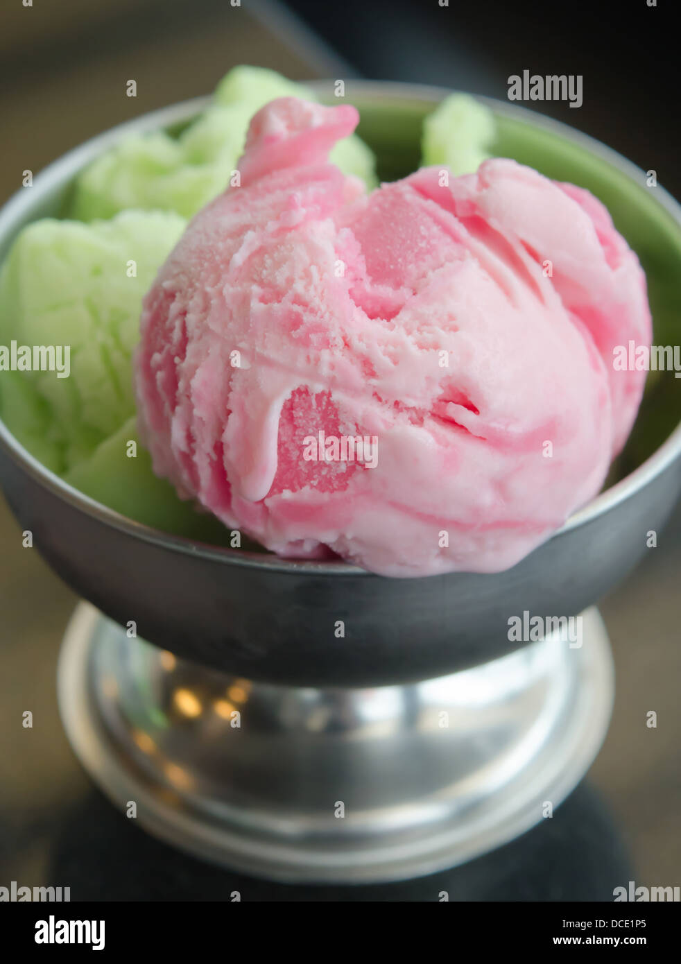 close up strawberry ice cream and green tea ice cream in bowl