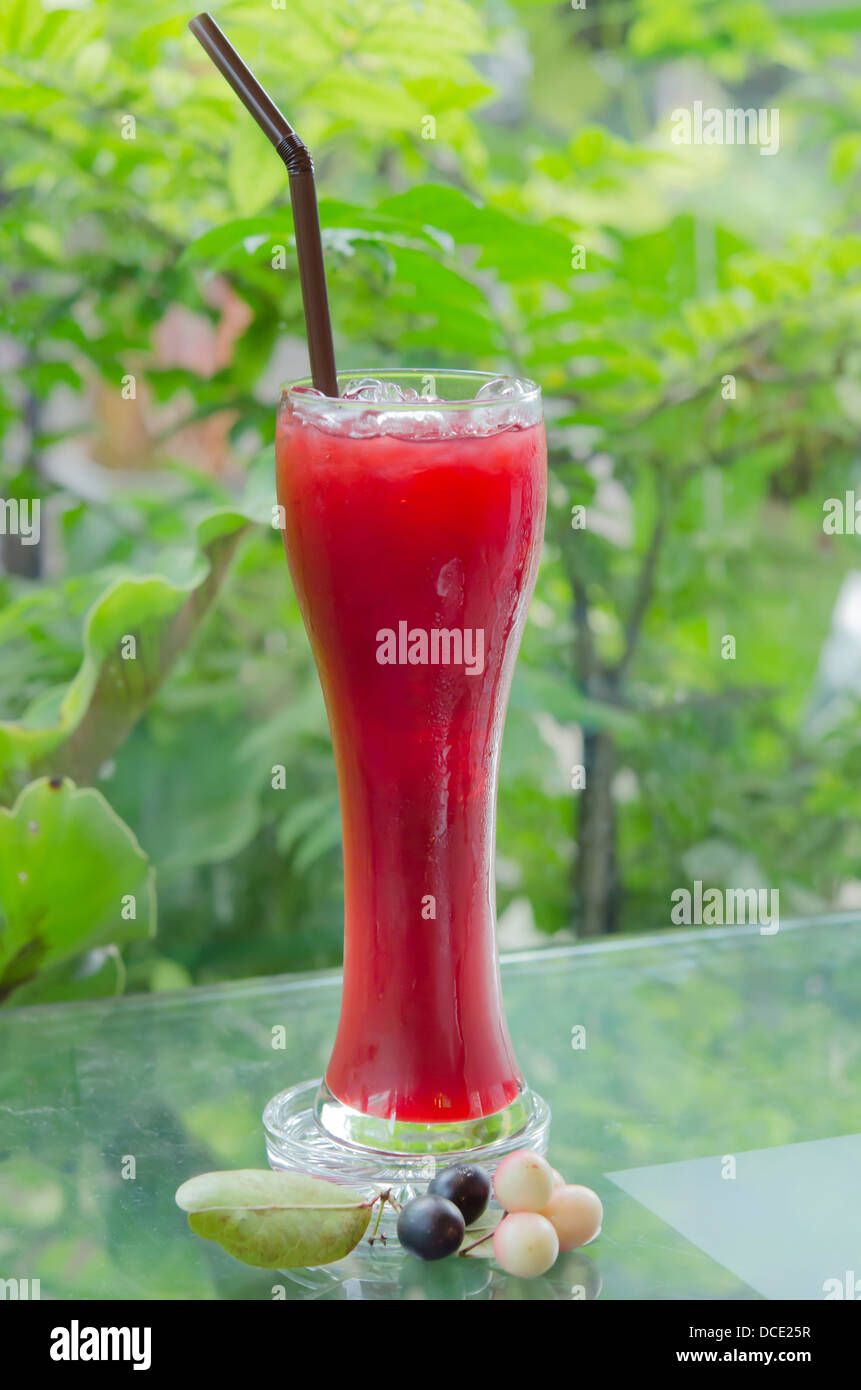 fresh karonda juice with ice in glass, Stock Photo
