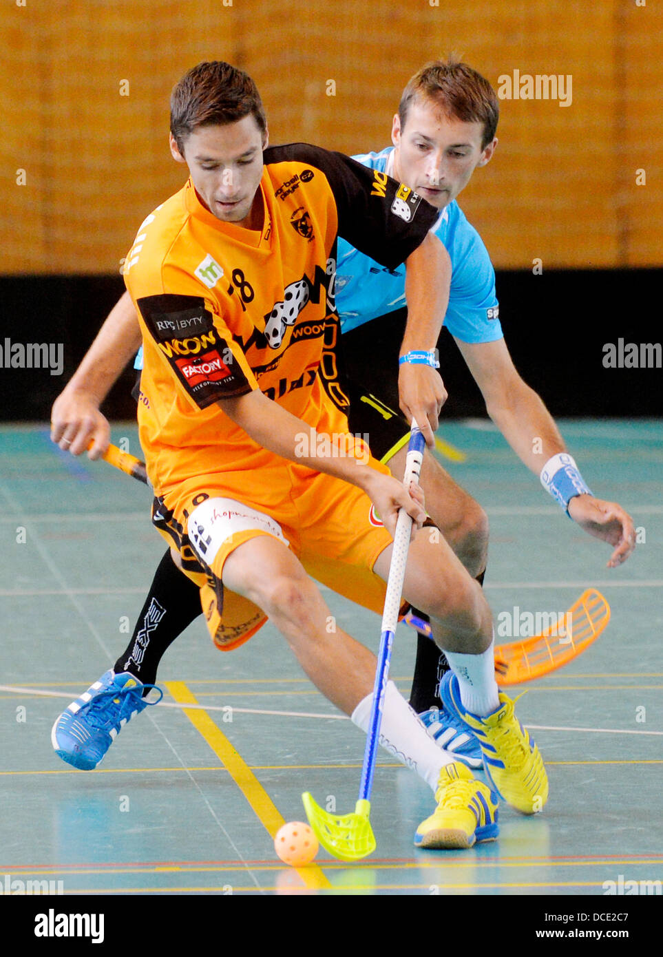 Prague, Czech Republic. 15th Aug, 2013. International Floorball tournament Czech Open match 1. SC Vitkovice vs Lekrings in Prague, Czech Republic on August 15, 2013. Oldrich Sova (left) of Vitkovice and Martins Rajeckis of Lekrings. © CTK/Alamy Live News Stock Photo