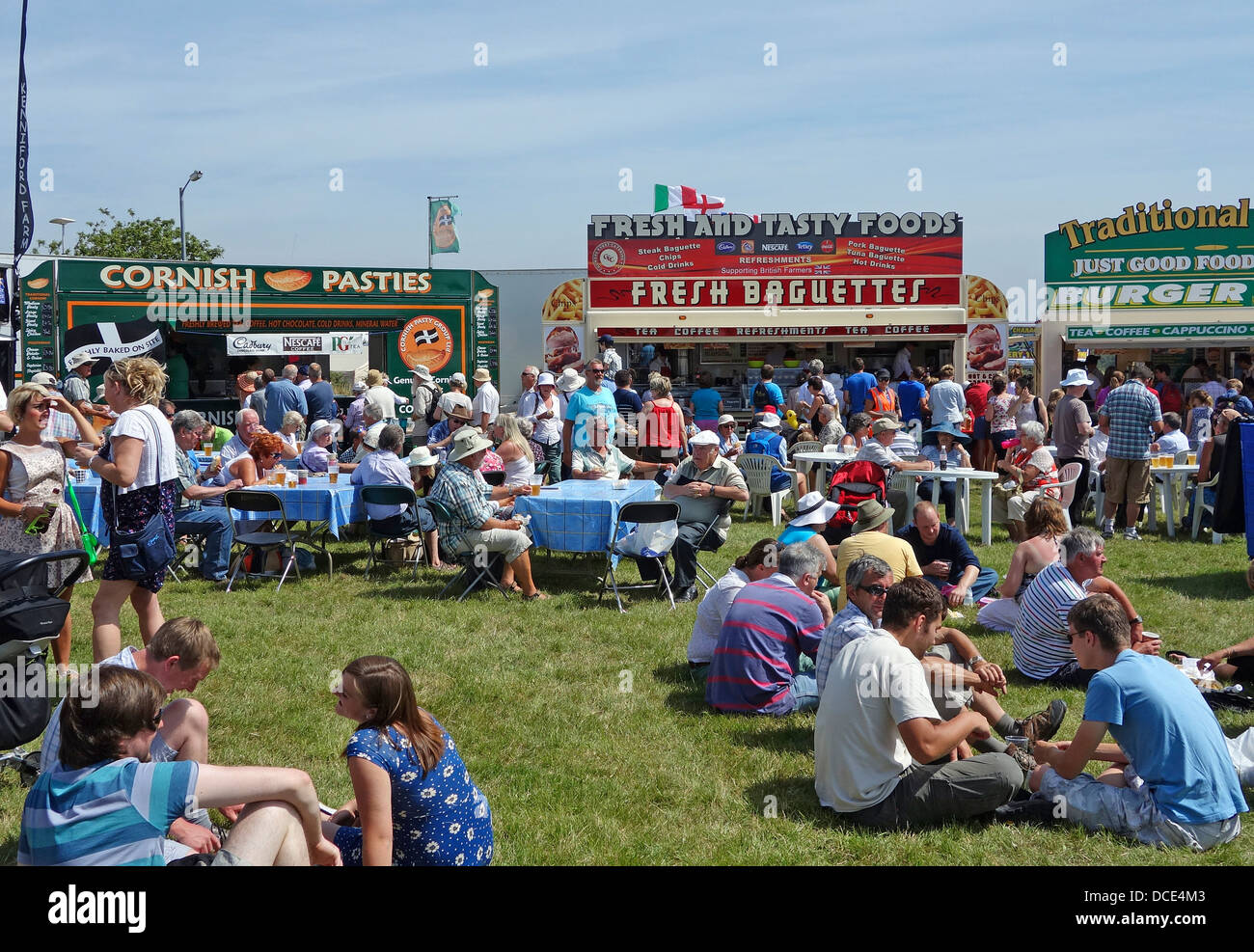 people relaxing by the refreshment area at stithians show in cornwall, uk Stock Photo