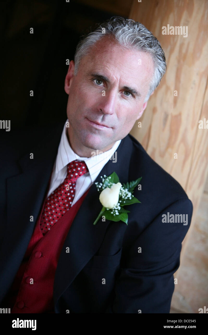 Man In A Suit With Flower On His Lapel Stock Photo