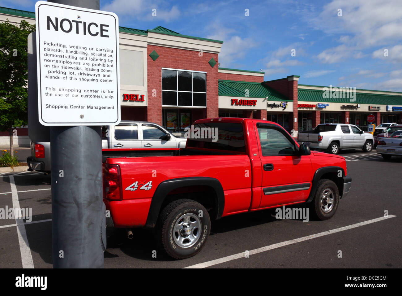 Sign in car park outside shopping mall banning demonstrations etc by non employees on the property, Cumberland, Maryland, USA Stock Photo