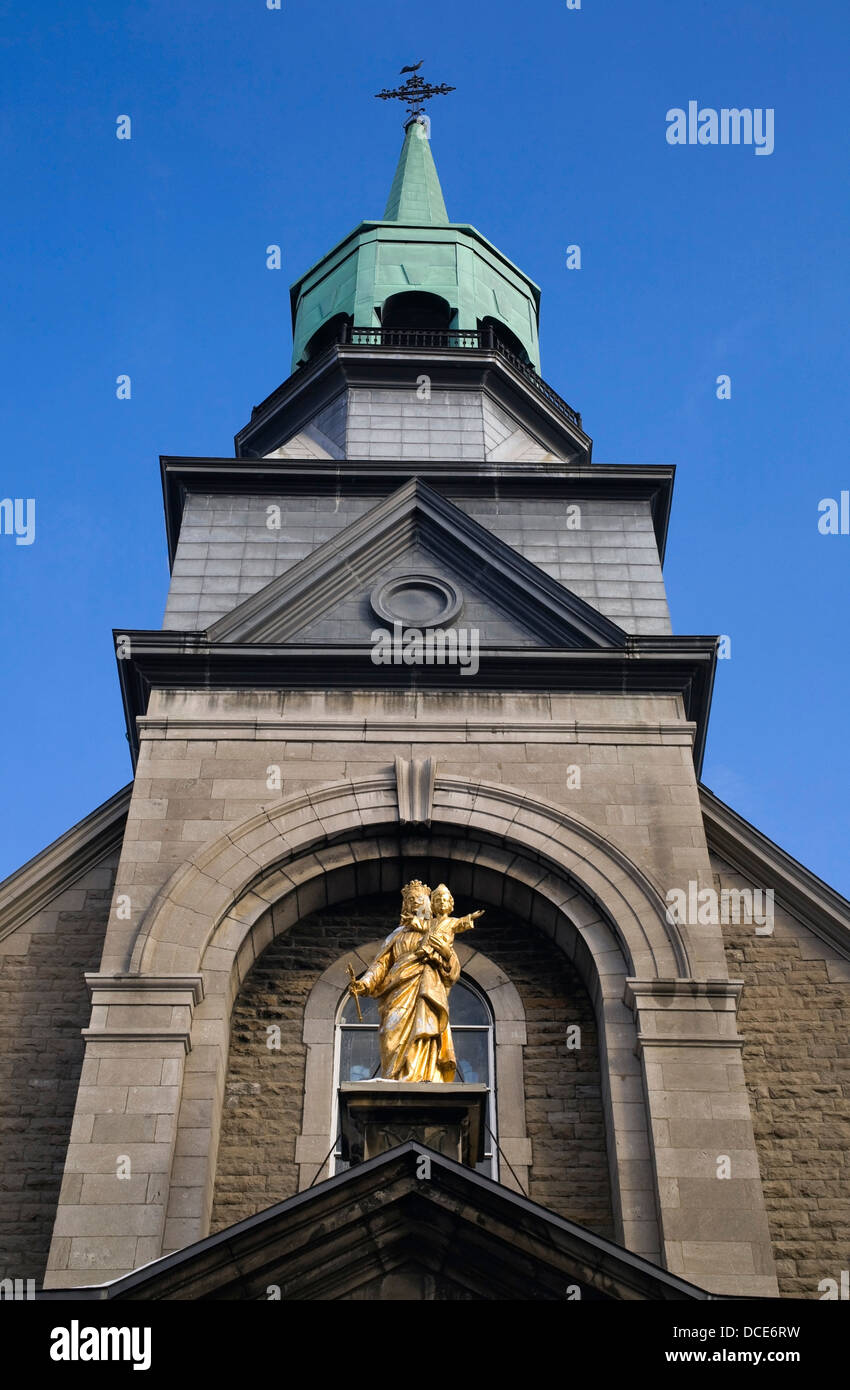 A Church With A Gold Statue Stock Photo