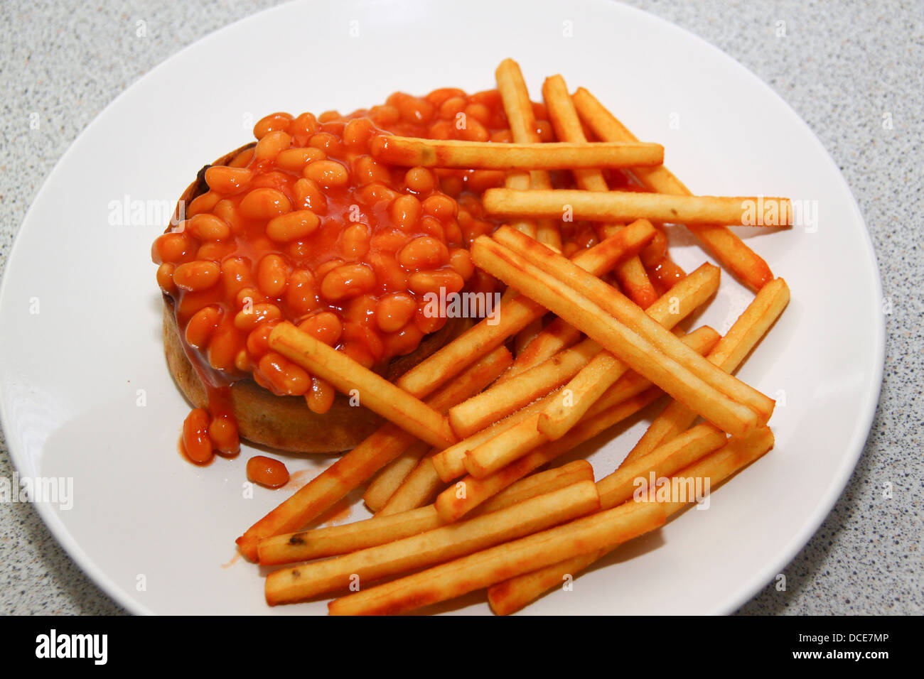 Scotch pie beans and chips meal Stock Photo Alamy
