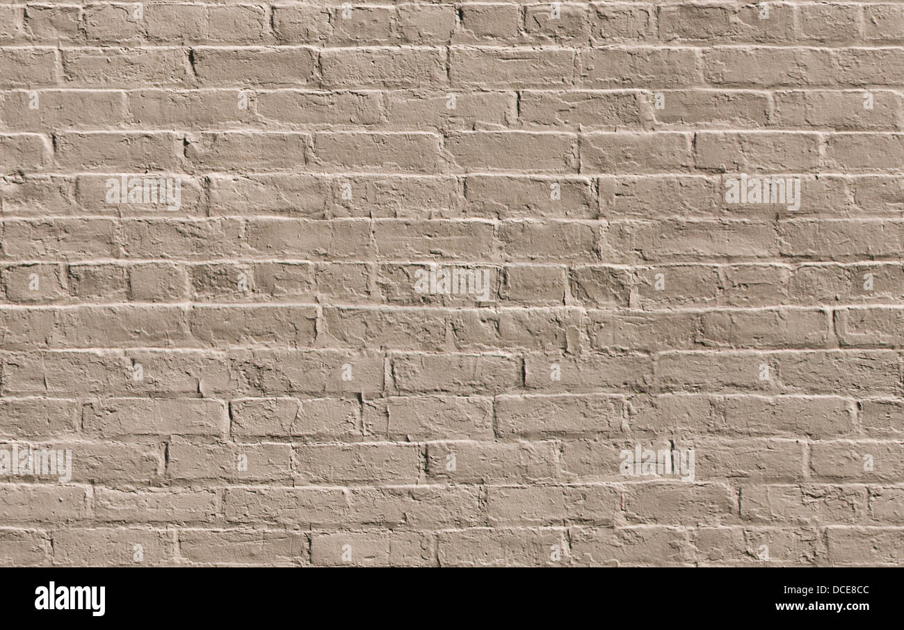 Beige painted brick wall seamlessly tileable background texture Stock Photo