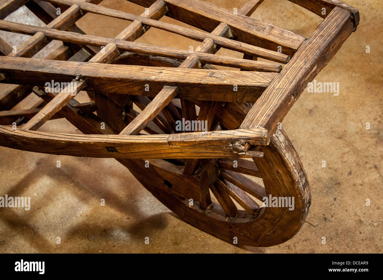 USA, Louisiana, Atchafalaya Basin, Breaux Bridge, Lagniappe Antiques, wheelbarrow. Stock Photo