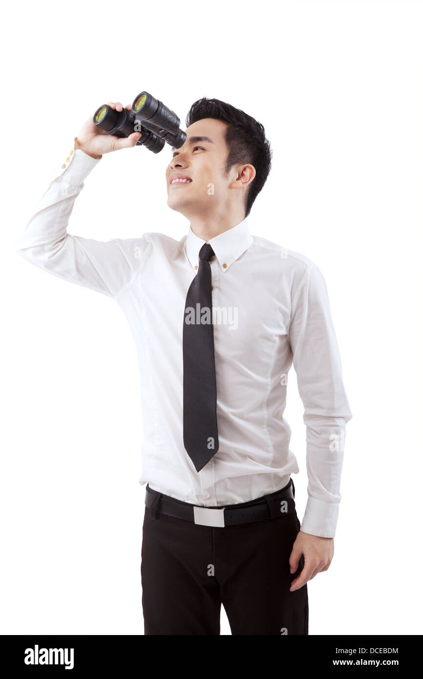 Business people use telescope Stock Photo - Alamy