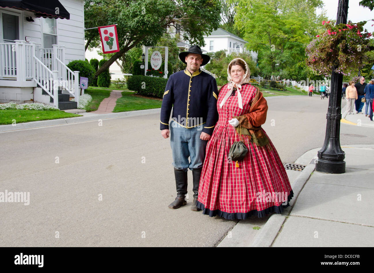 Michigan, Mackinac Island. Local couple in historic period attire. Stock Photo
