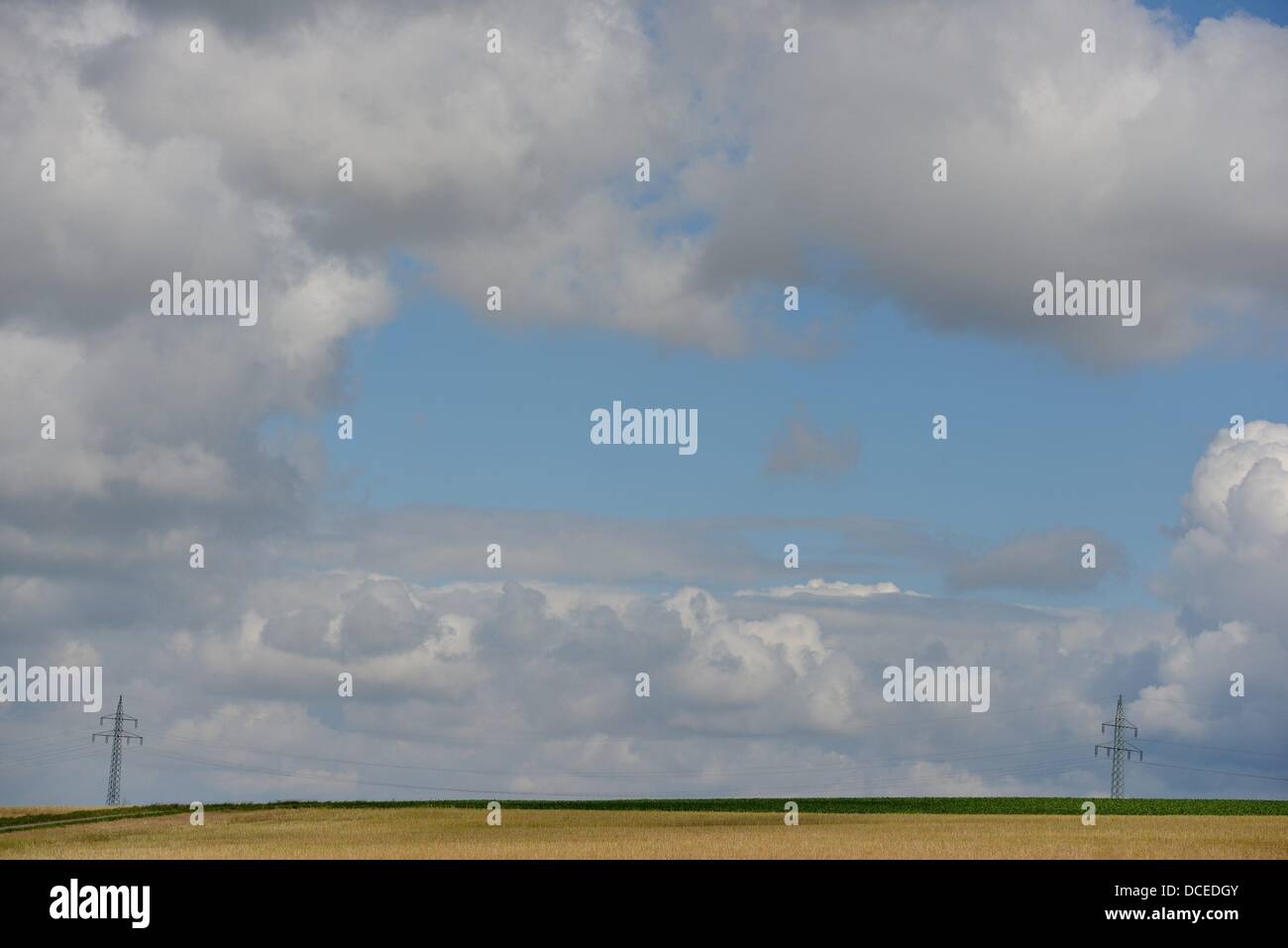 Stubble field with cloudy sky in Germany. Photo Frank May Stock Photo