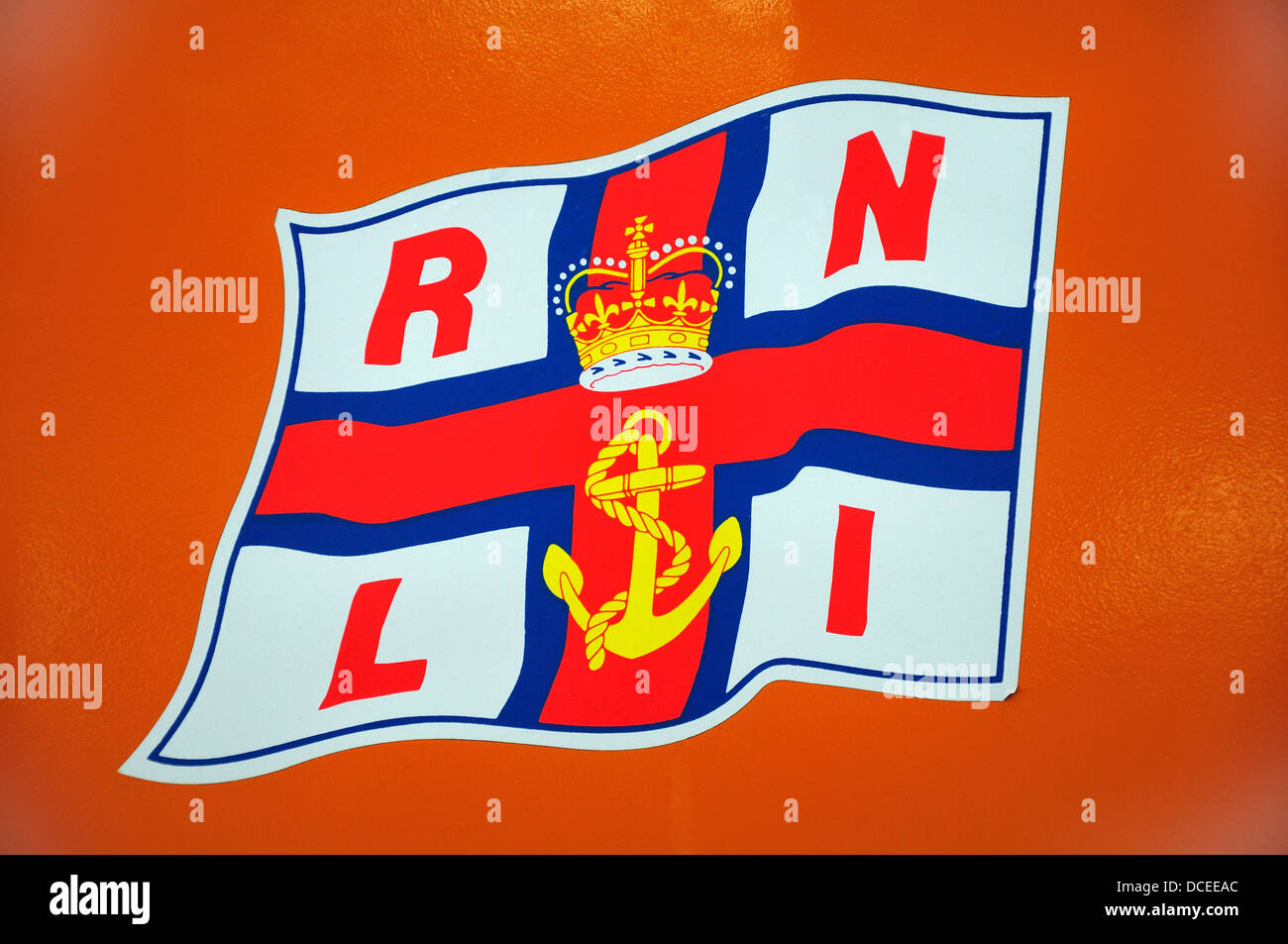 Chatham, Kent, England, UK. Chatham Historic Dockyard. RNLI Flag on one of the boats in the Lifeboat Collection Stock Photo