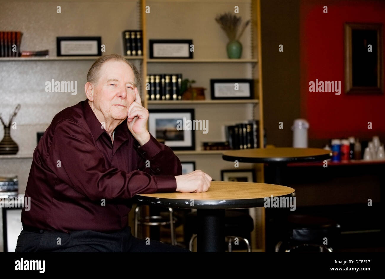 Elderly man in coffee shop Stock Photo Alamy