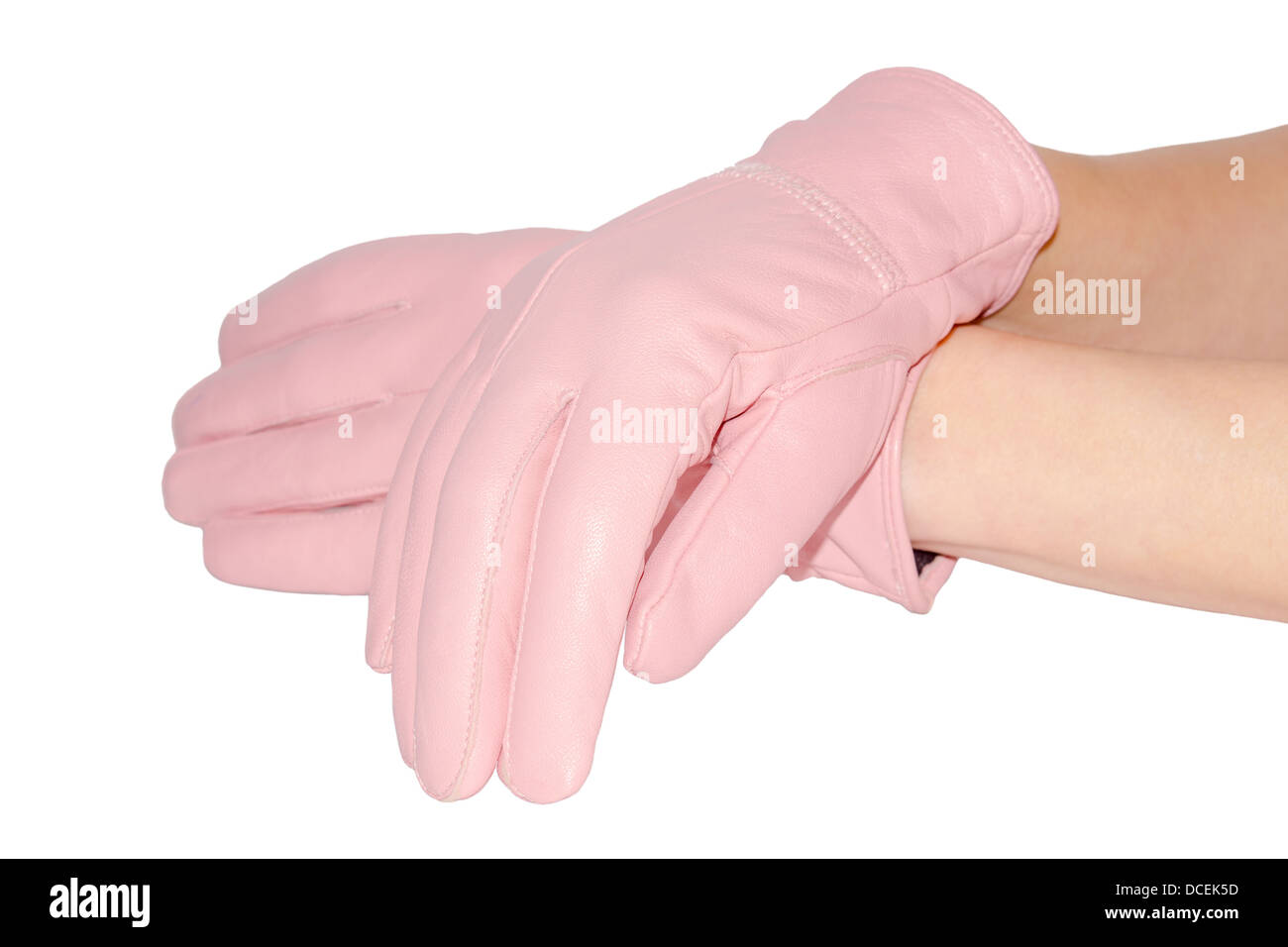 Graceful hands in leather pink gloves isolated on white Stock Photo