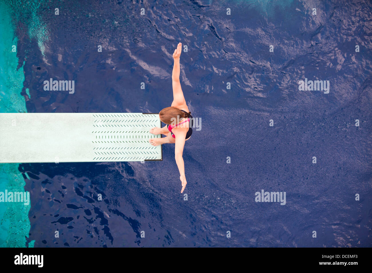 high diver jumping into the water Stock Photo Alamy