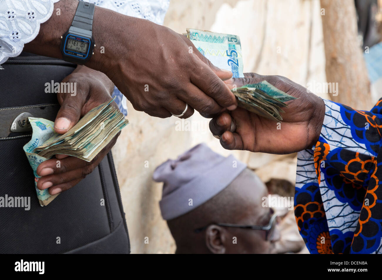 Cashew Nut Buyer Paying a Seller, Fass Njaga Choi, The Gambia Stock Photo