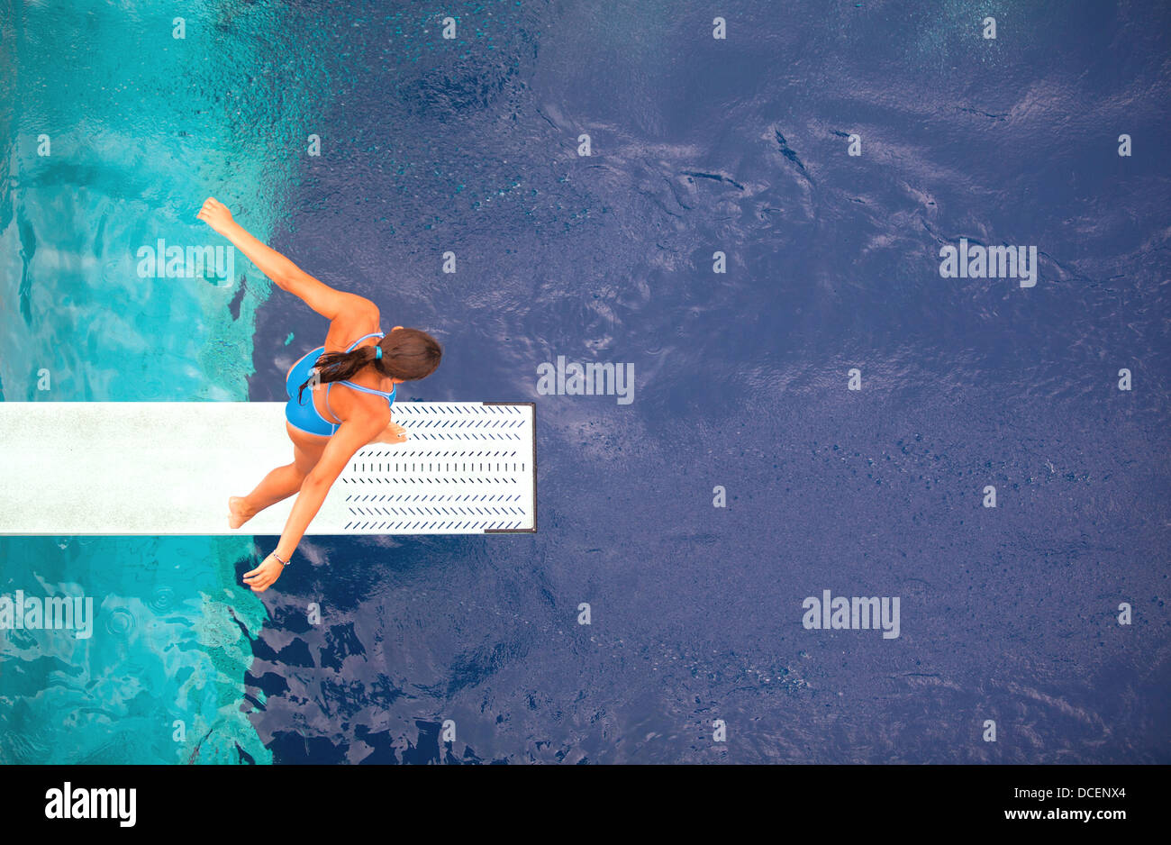 high diver jumping into the water Stock Photo Alamy