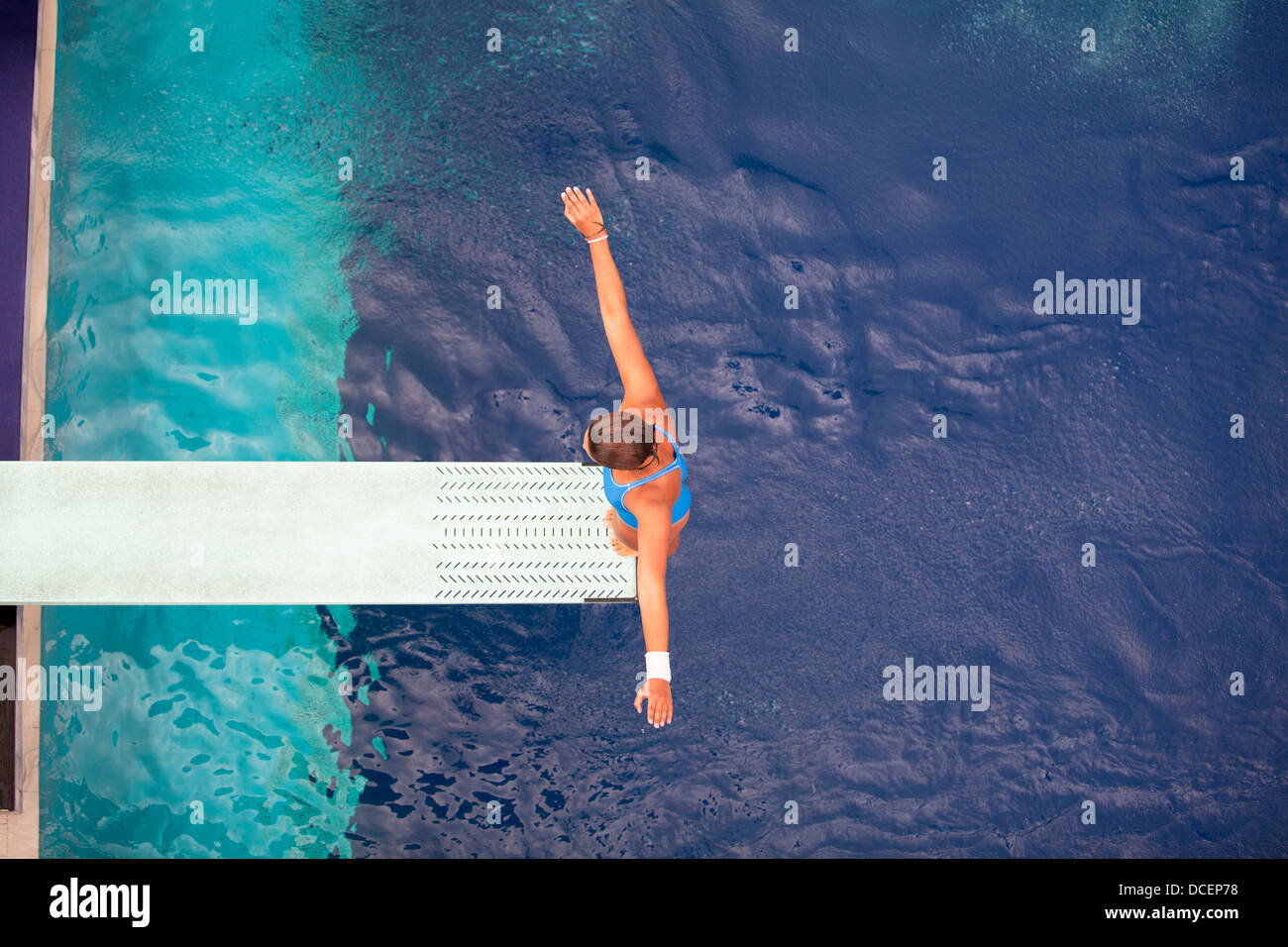high diver jumping into the water Stock Photo Alamy
