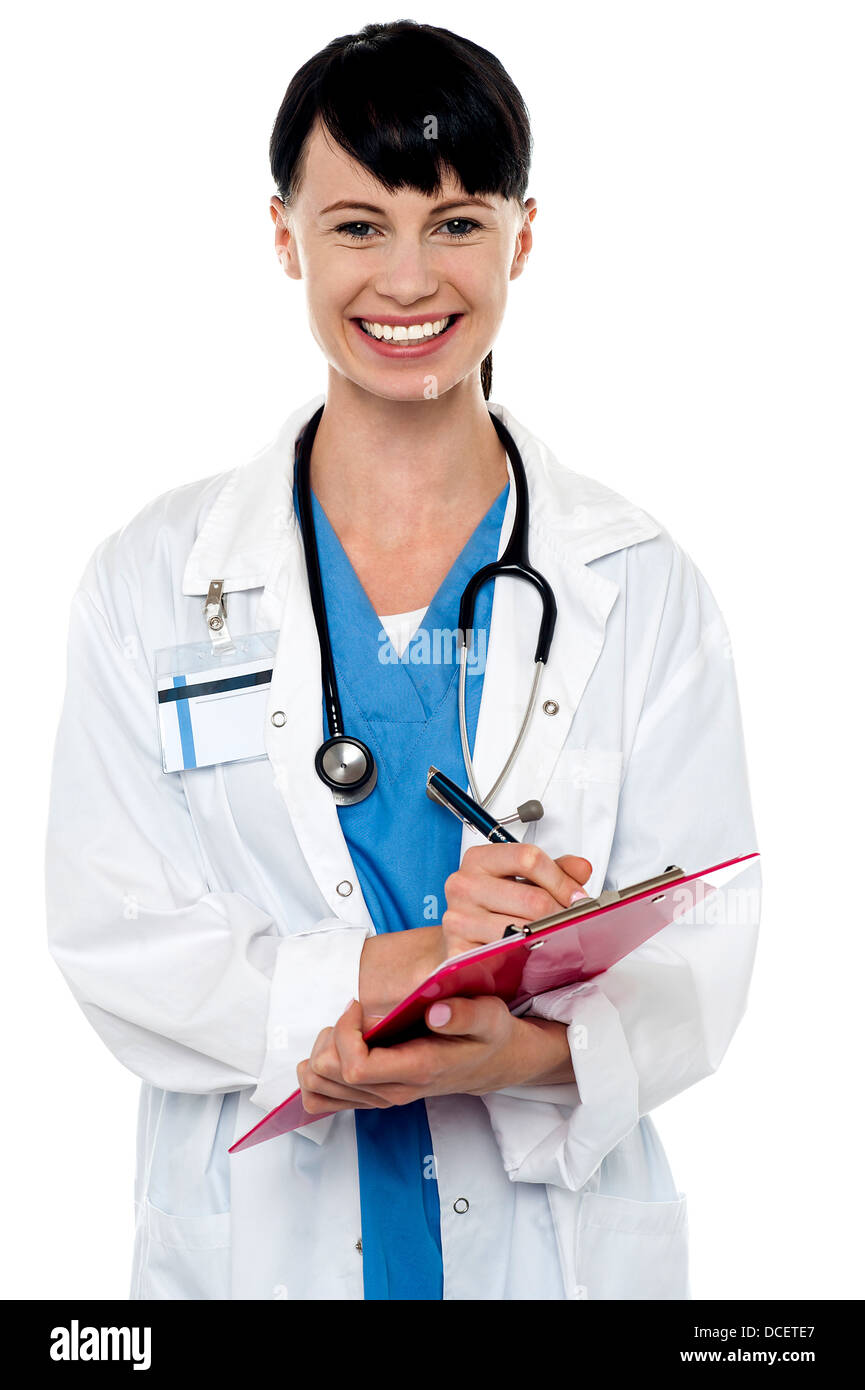 Friendly doctor updating medical record of a patient. Writing new prescription Stock Photo Alamy
