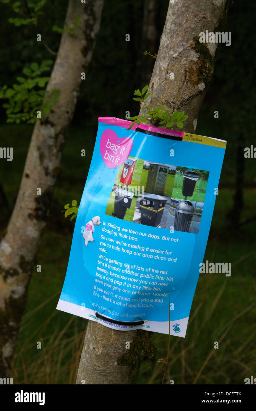 Bag it bin it poster urging dog walkers to clean up Stock Photo