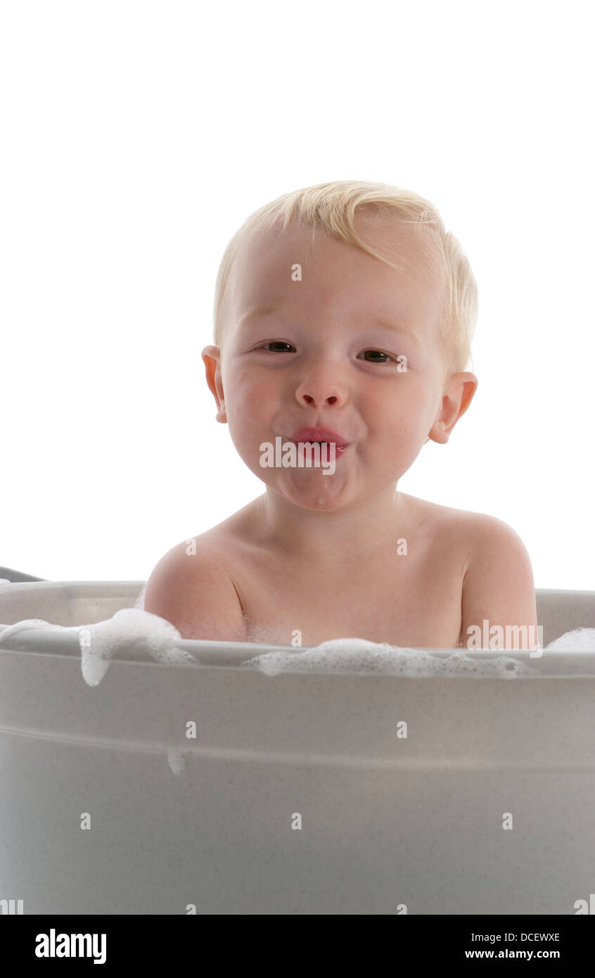Baby boy in bathtub Stock Photo Alamy