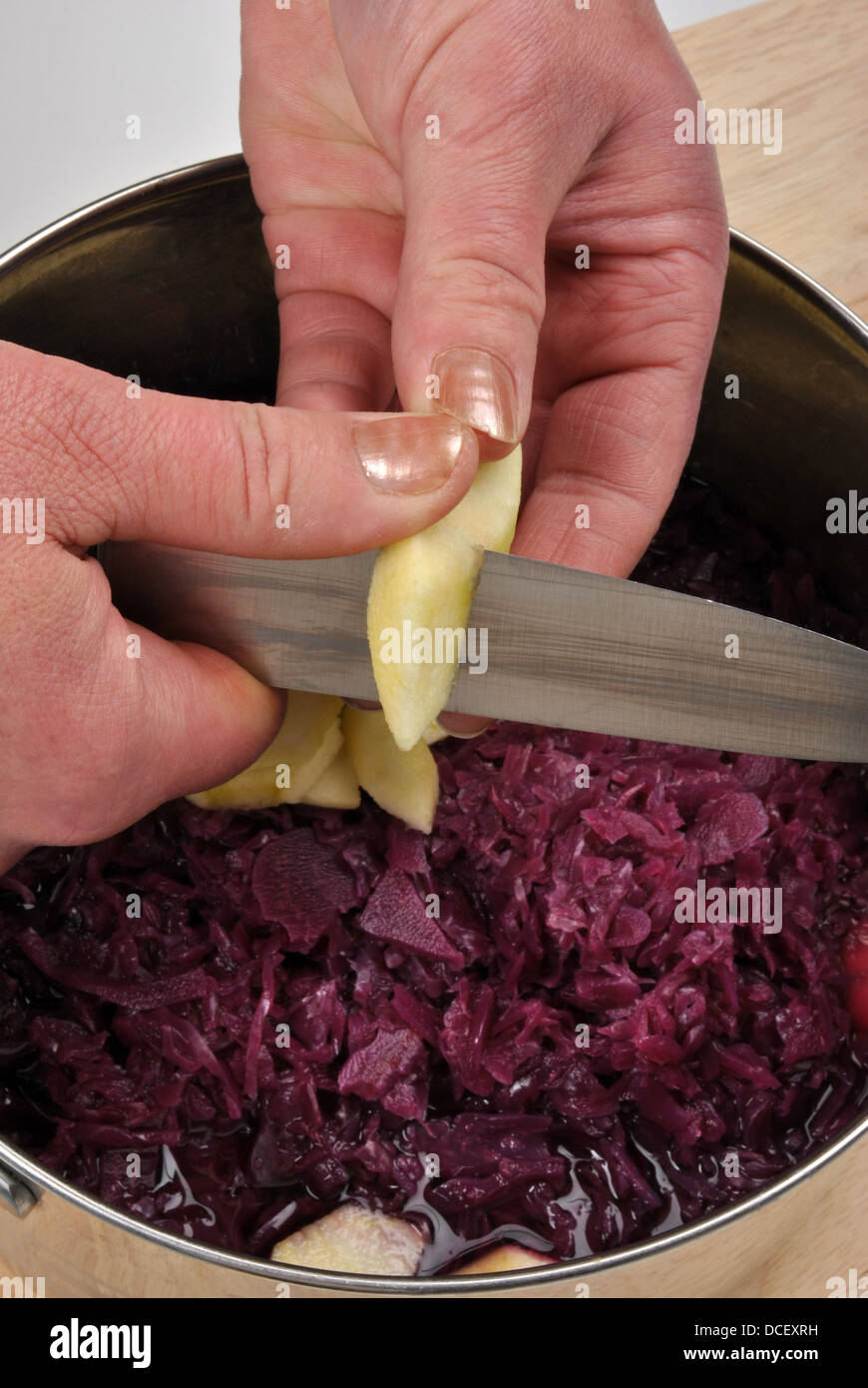 how to prepare red cabbage and organic apple Stock Photo - Alamy
