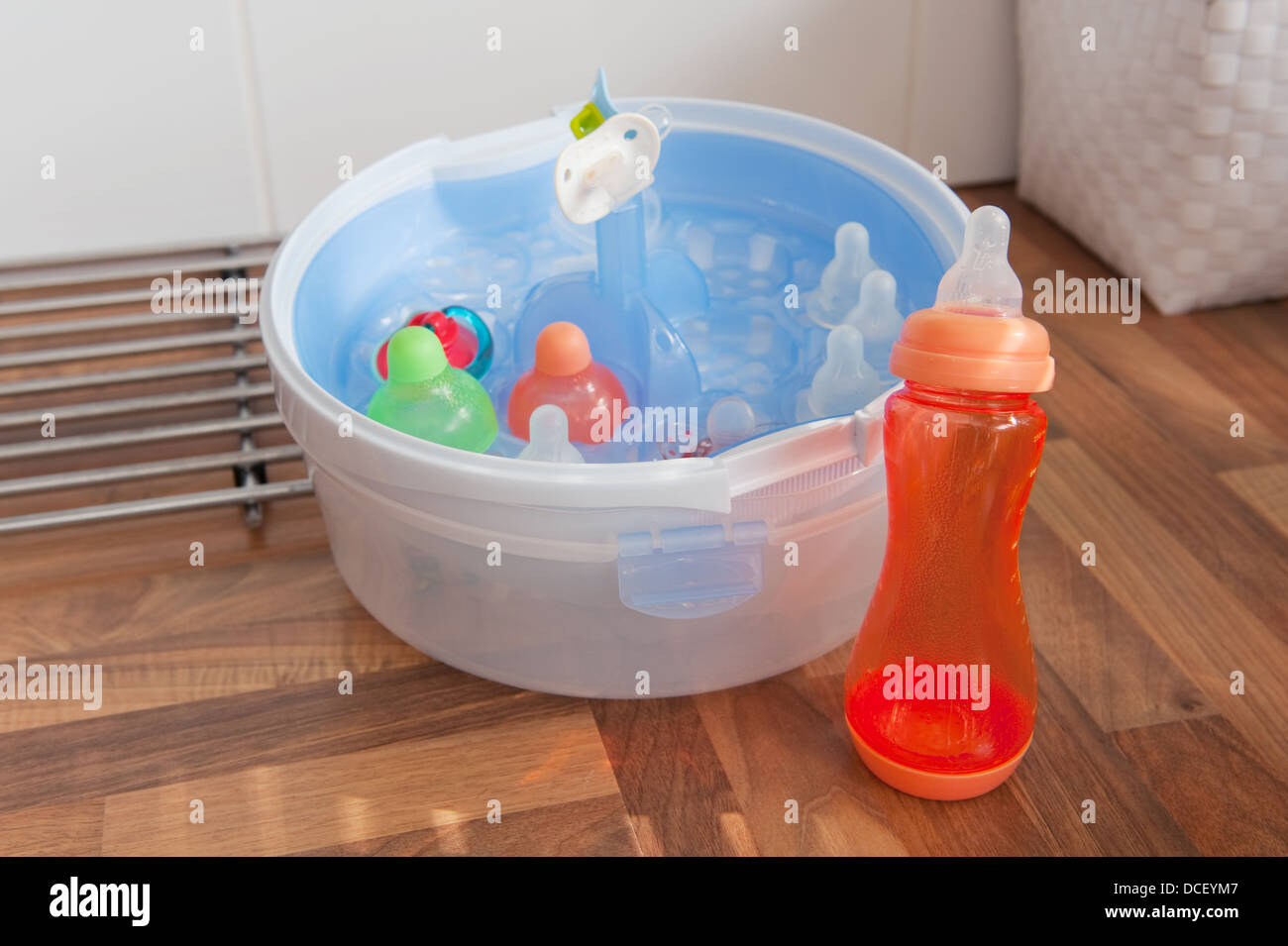 cleaning the baby bottles Stock Photo Alamy