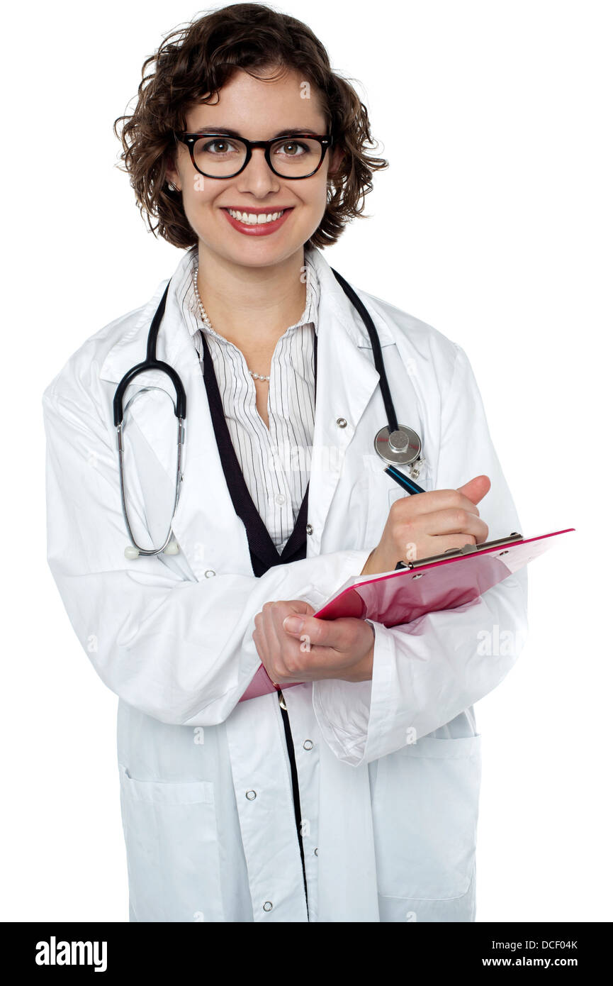 Happy female physician writing hi-res stock photography and images - Alamy