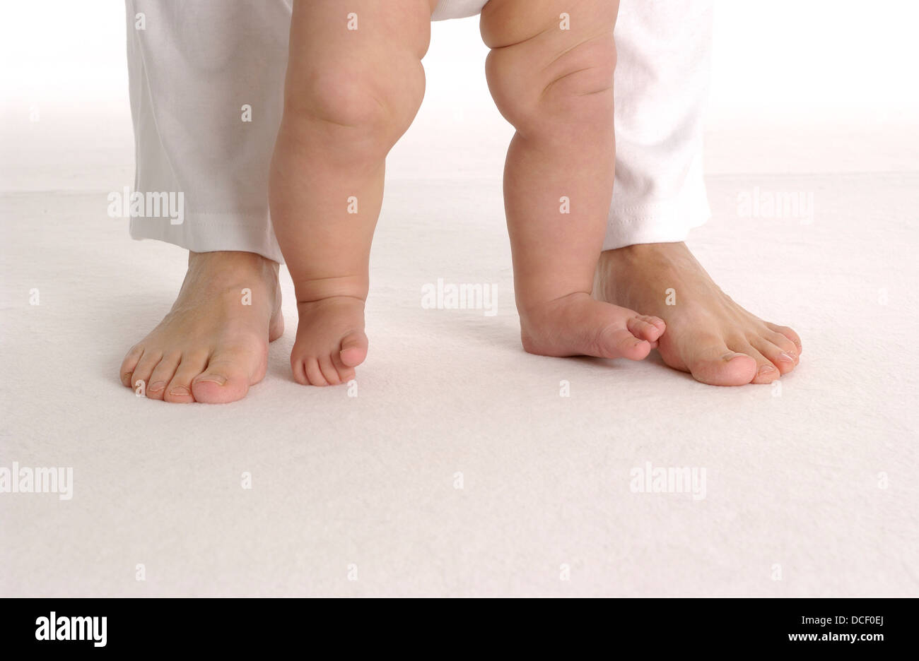 Large and small feet Stock Photo