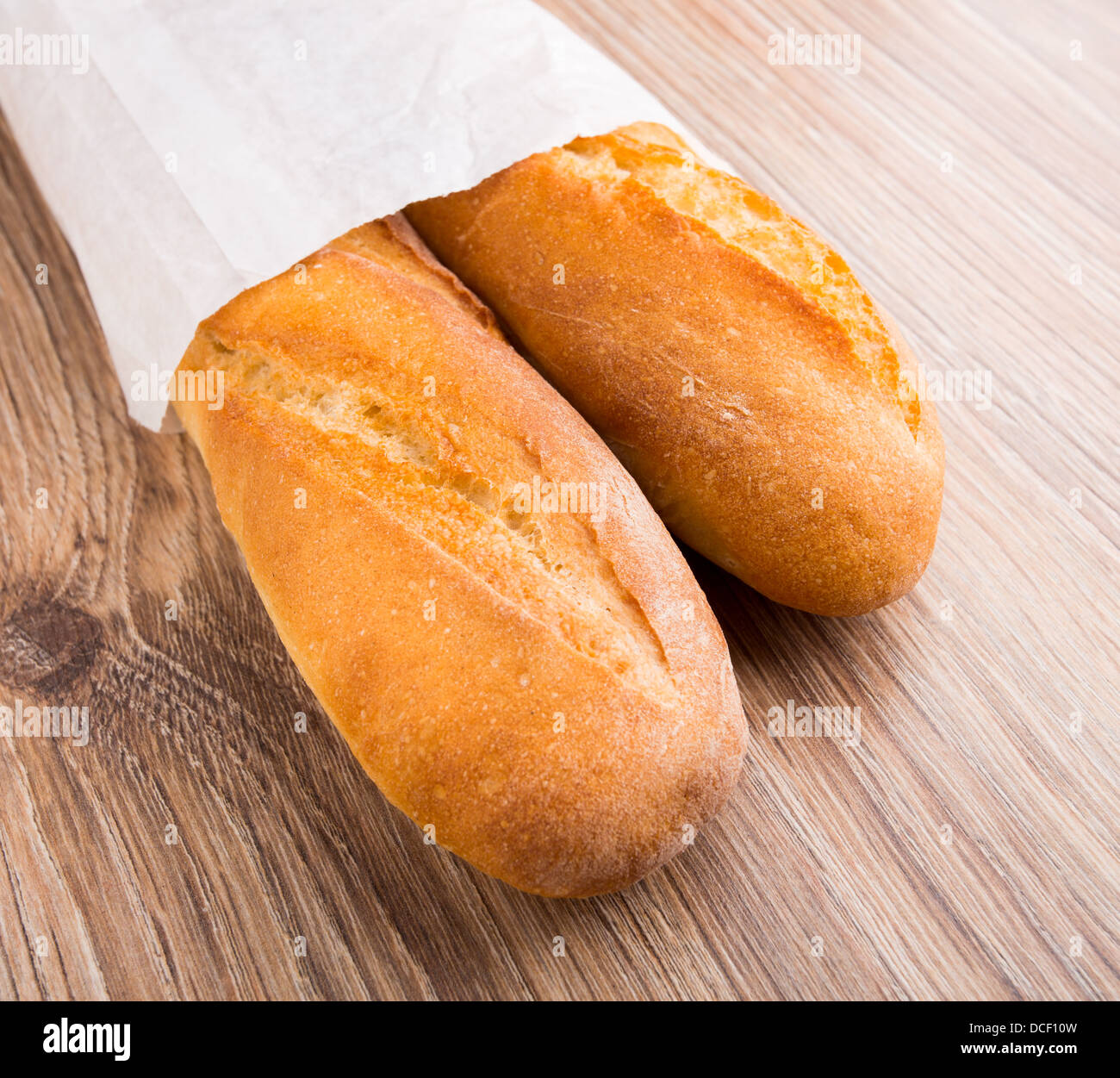 Baguette in paper bag Stock Photo - Alamy