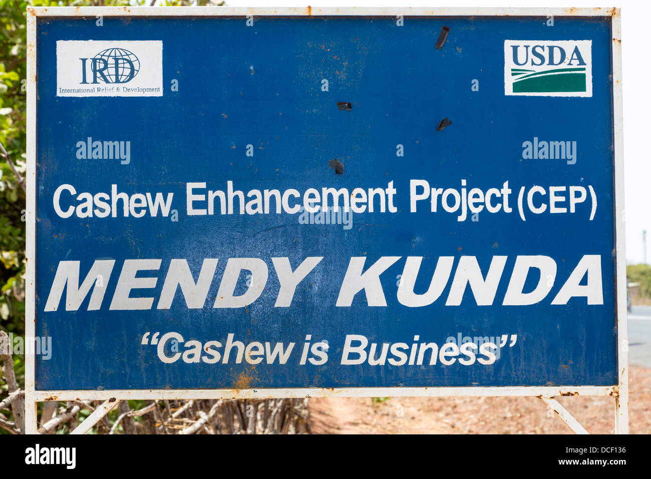 Cashew Nut Sign, Erected by U.S. Department of Agriculture and International Relief and Development (IRD), a Non-Profit NGO. Stock Photo