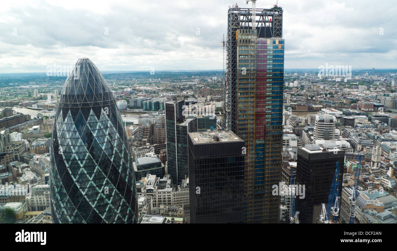 Aerial high view looking south over London of the 122 Leadenhall St building the Cheesegrater and the Gherkin in the  City of London UK KATHY DEWITT Stock Photo