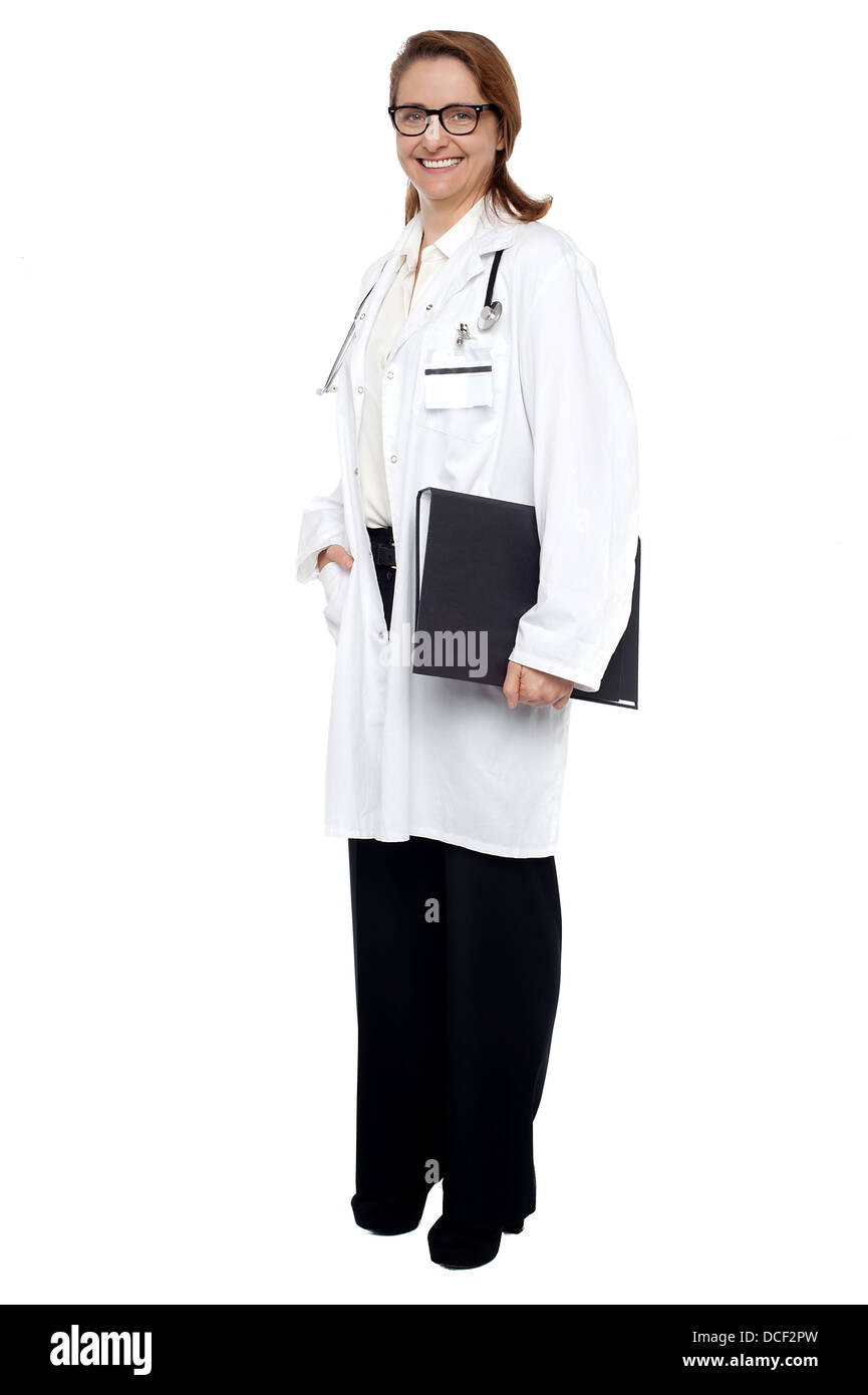 Full length shot of a physician holding medical file. Stock Photo