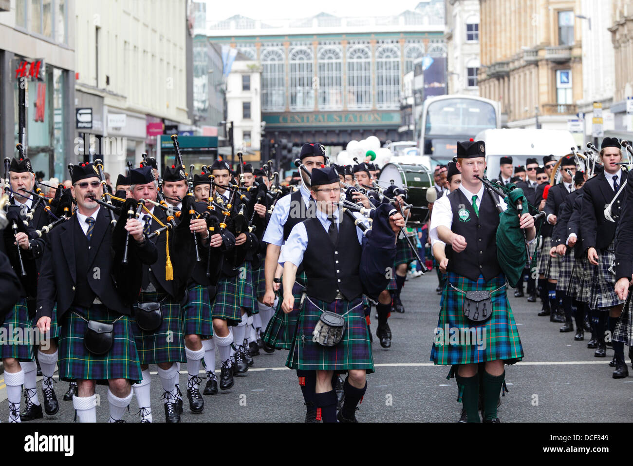 Argyle Street, Glasgow, Scotland, UK, Friday, 16th August, 2013. Four Pipe Bands marching in the traditional Beat The Retreat during the Piping Live! Festival Stock Photo