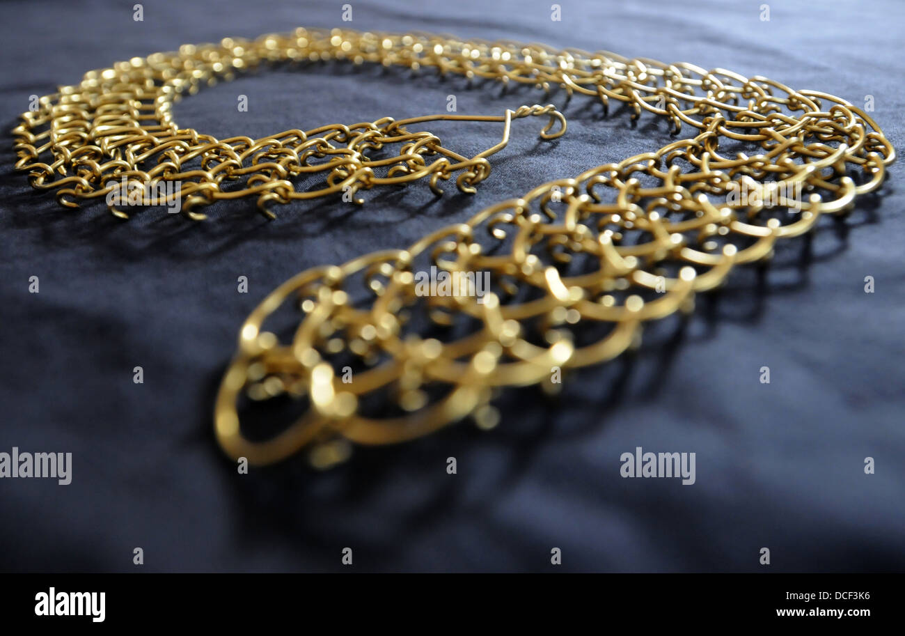 A copper full leg Cilice belt used for penance Stock Photo - Alamy