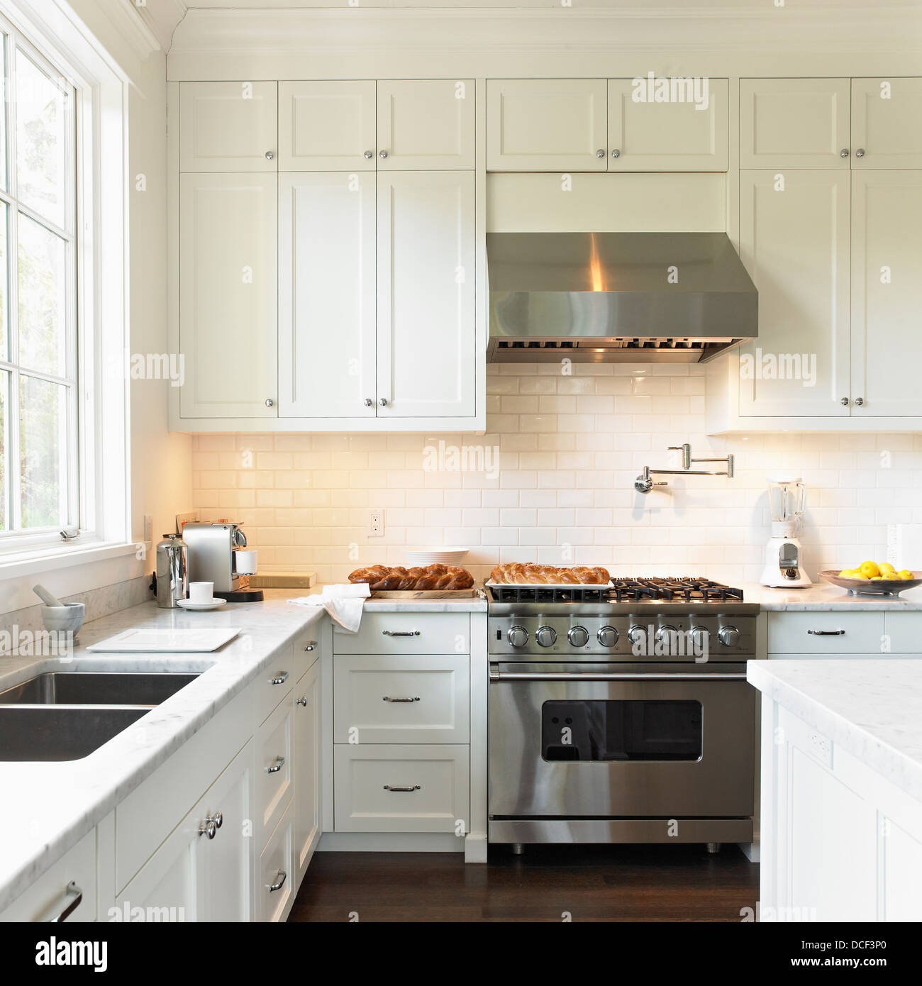 Cream kitchen with high-end viking stove and range hood;Victoria vancouver island british columbia canada Stock Photo