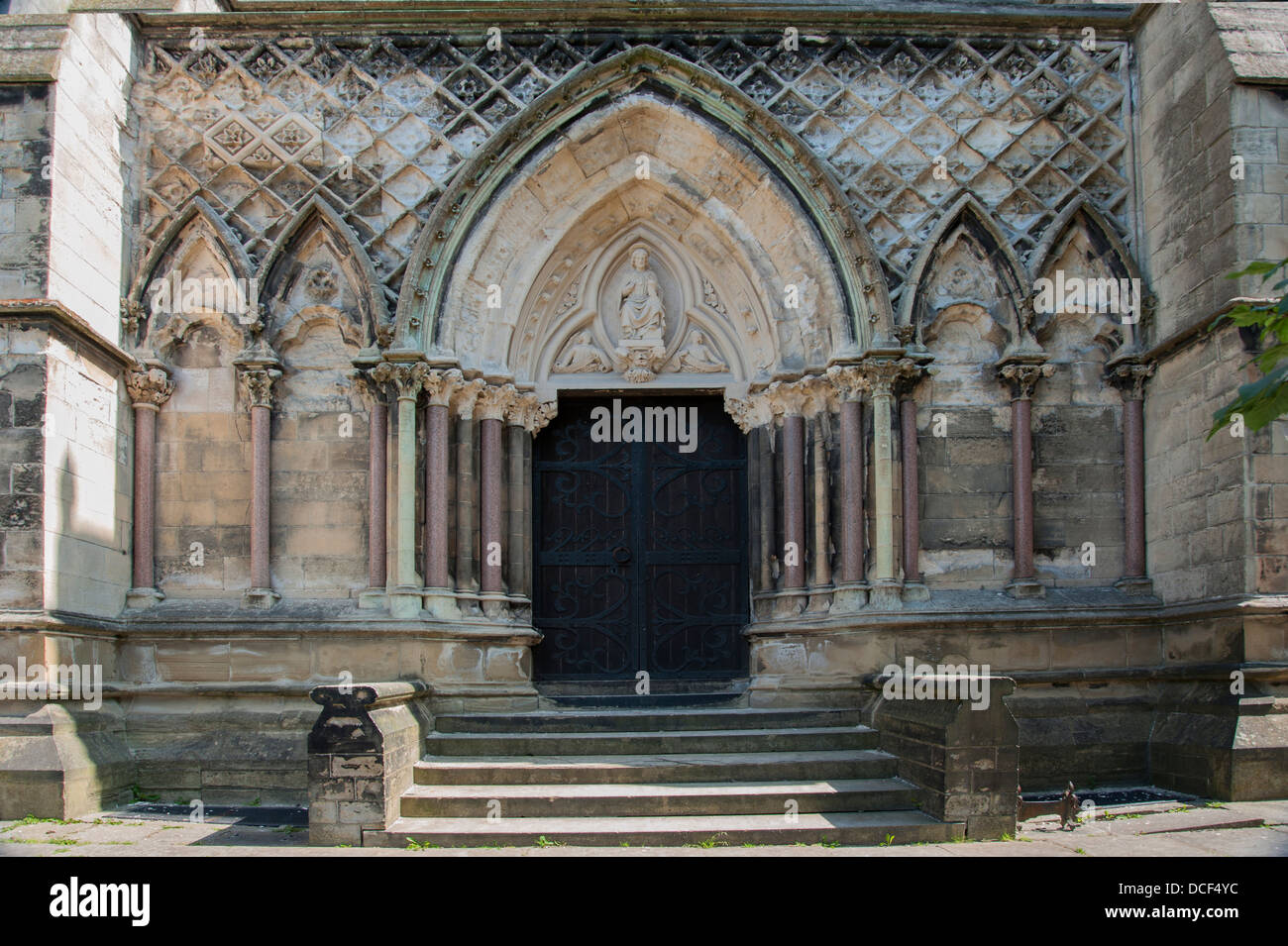detail of the south entrance doorway to all souls church akroydon Stock ...