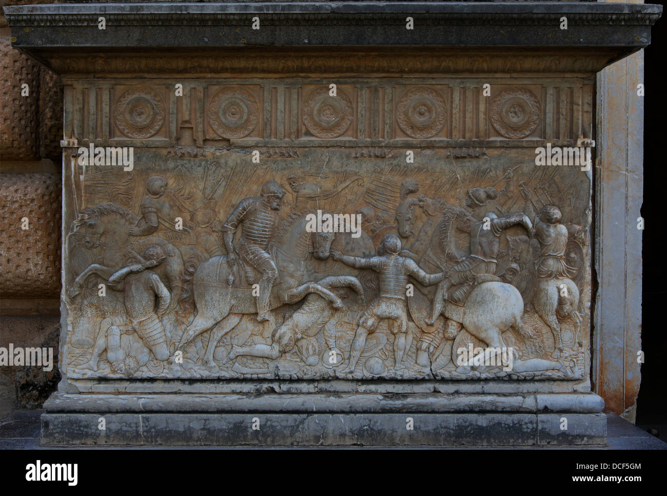 relief of a fight during the Renaissance, entry of Emperor Charles Vth palace, Alhambra, Granada, Spain Stock Photo