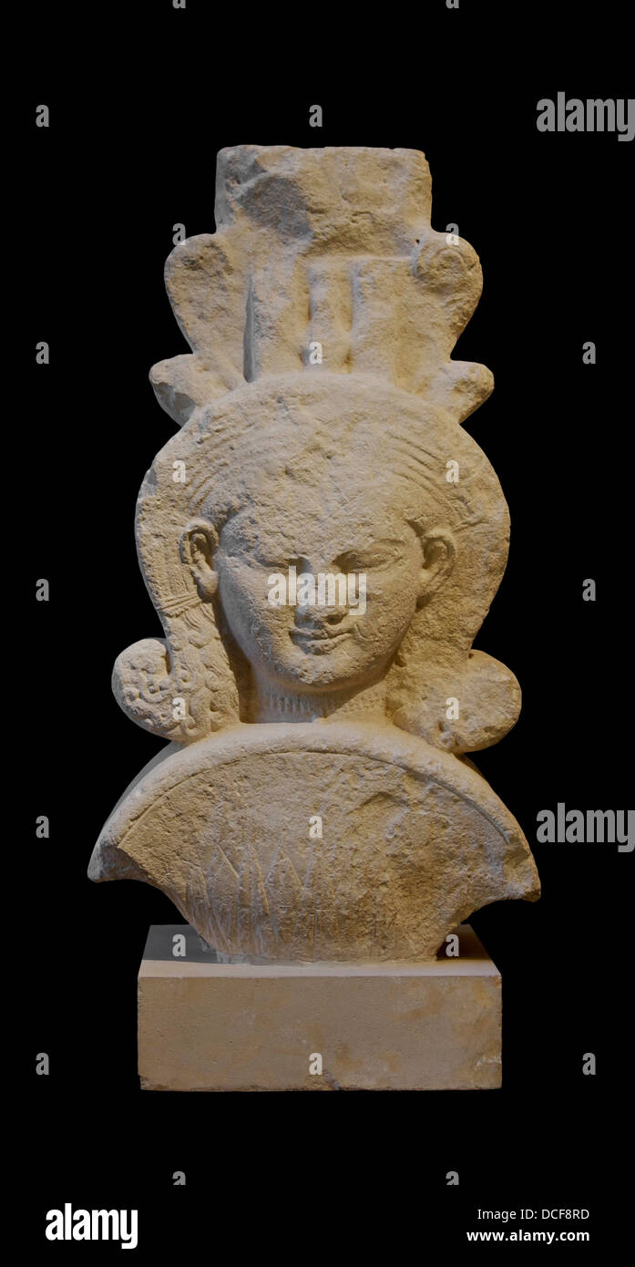Carved capitals: a papyrus umbel a Hathor head is surmounted by a uraeus naiskos housing Stock Photo