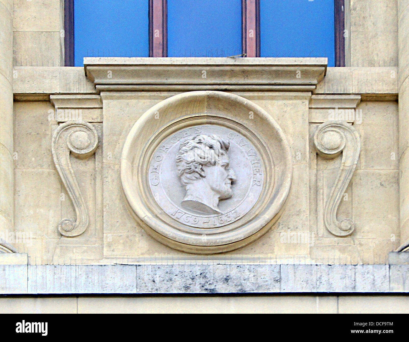 Cuvier. Fourth mascaron (left) of the façade of the Grande Galerie de l'Evolution in Jardin des Plantes of Paris Stock Photo