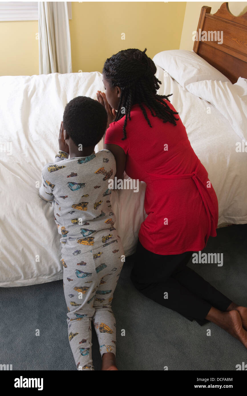 Child praying bedtime hi-res stock photography and images - Alamy
