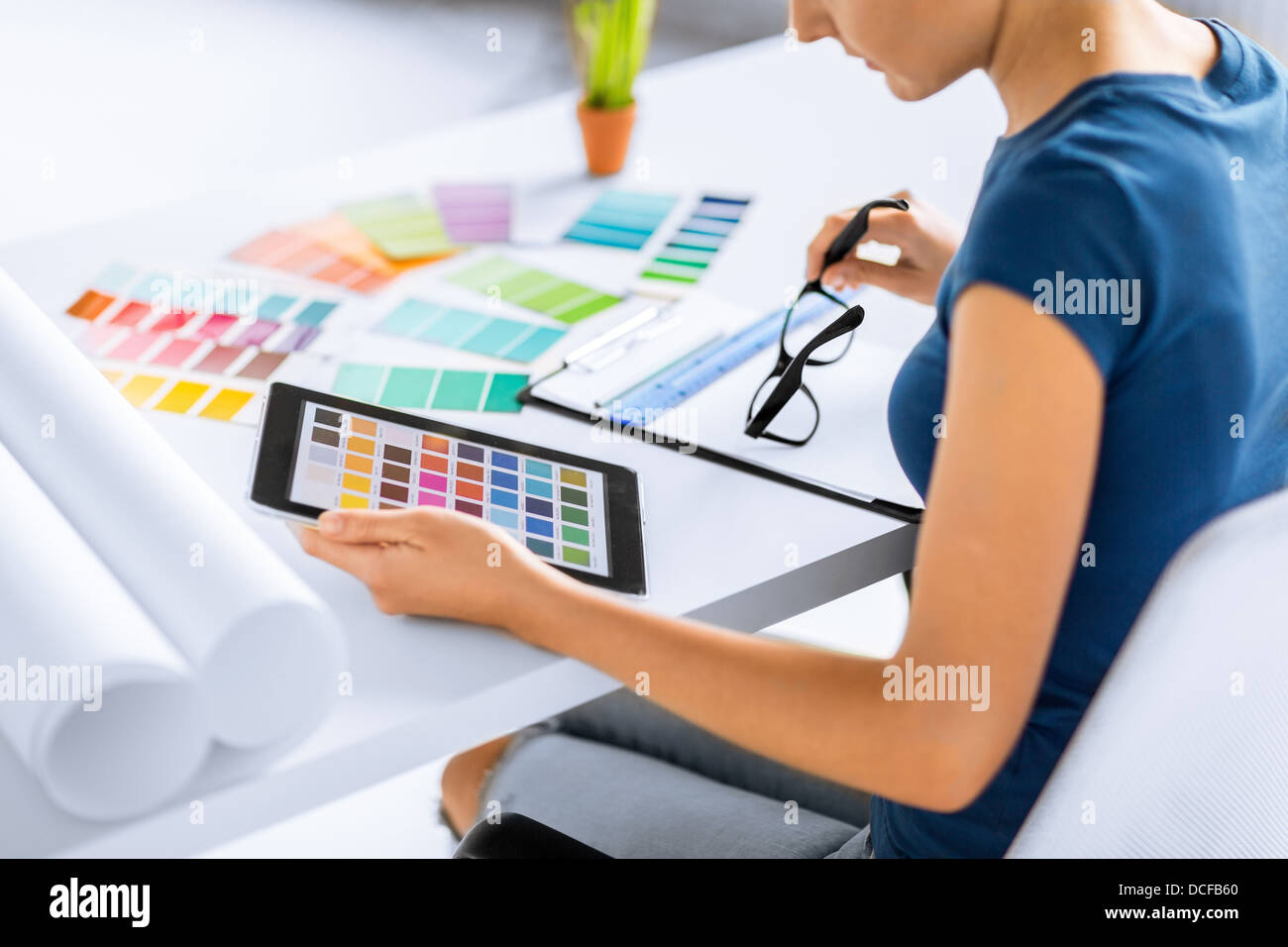 woman working with color samples for selection Stock Photo - Alamy