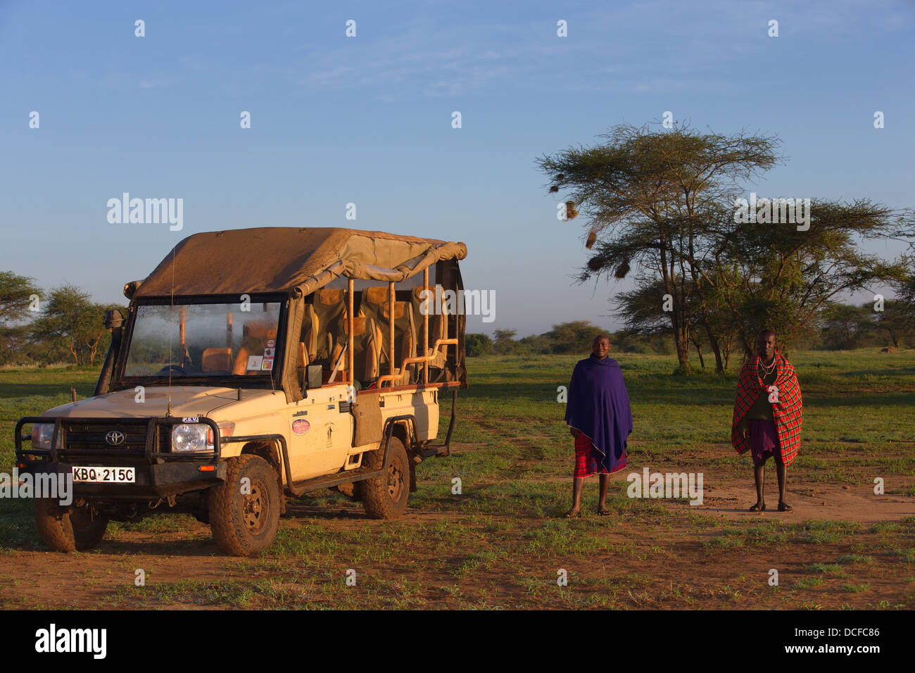 Masai safari guides on Ol Kinyei Conservancy. Kenya, Africa. Stock Photo