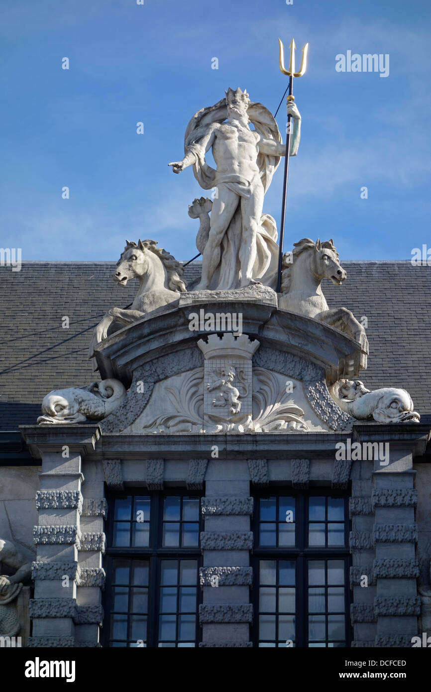 Statue of the Roman god Neptune with trident above the entrance to the Old Fish Market / Oude Vismijn in Ghent, Belgium Stock Photo