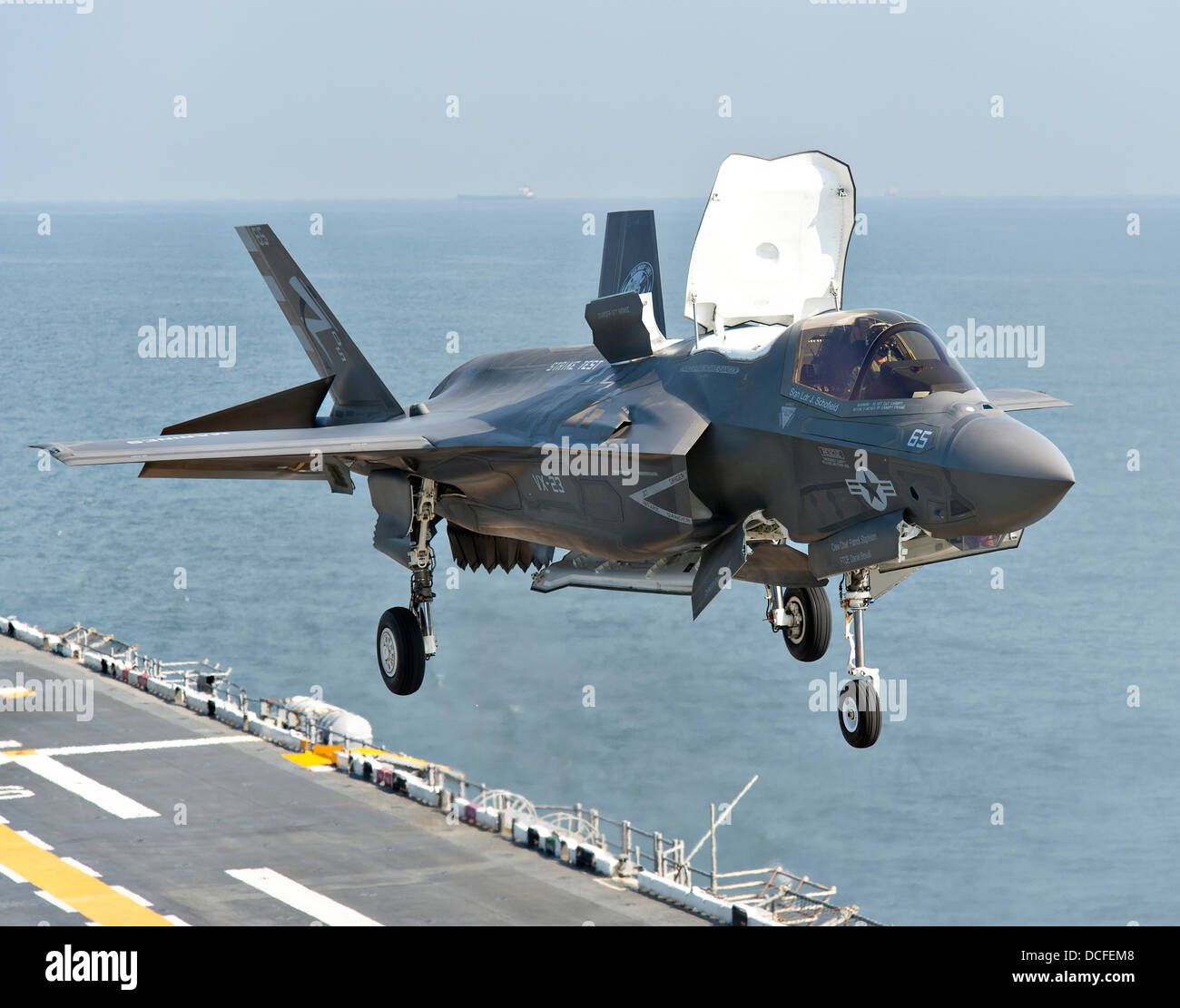 A Marine Corps F-35B Lightning II stealth fighter aircraft takes off from the amphibious assault ship USS Wasp during the second at-sea F-35 developmental test August 14, 2013 in the Atlantic Ocean. The F-35B is the Marine Corps variant of the joint strike fighter is a vertical take off and landing aircraft. Stock Photo